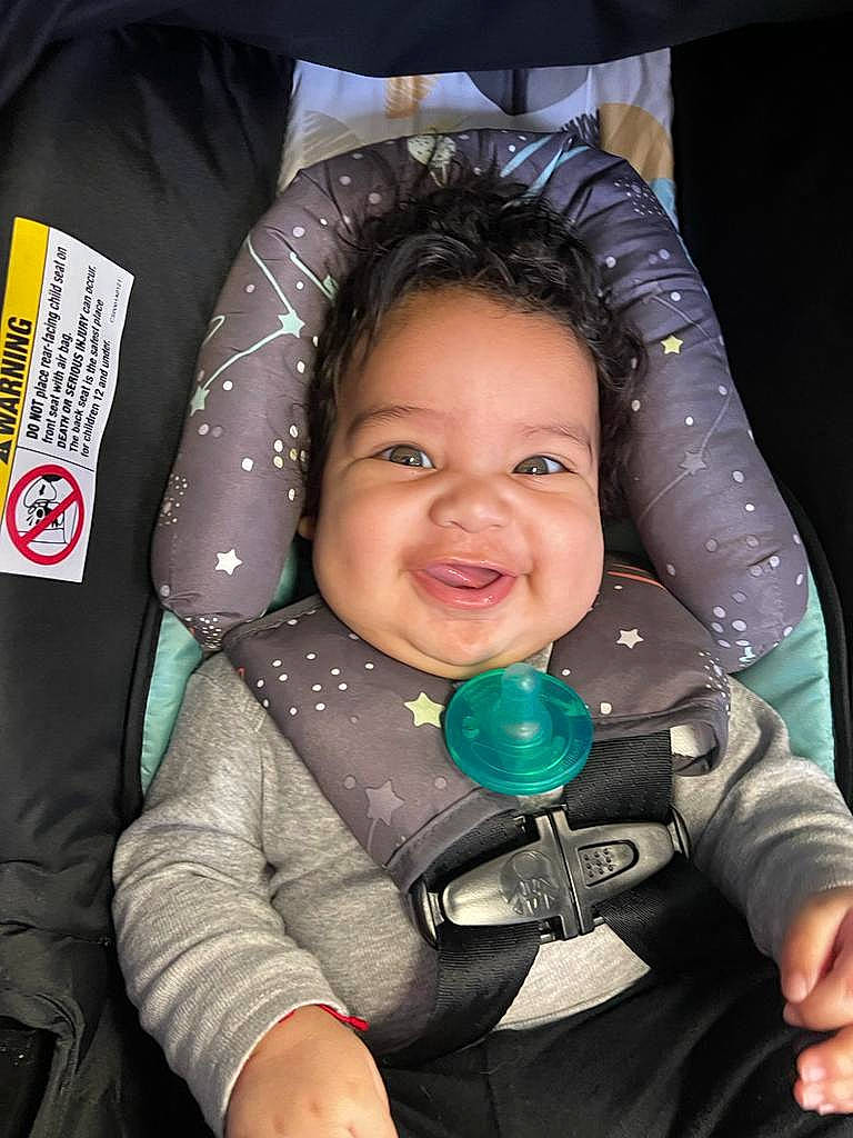 Brandon is registered to the contest to win money with this photo: baby, cheek, comfort, cool, eye, facial_expression, flash_photography, gesture, happy, head, human, iris, nose, outerwear, people, person, product, skin, sleeve, smile