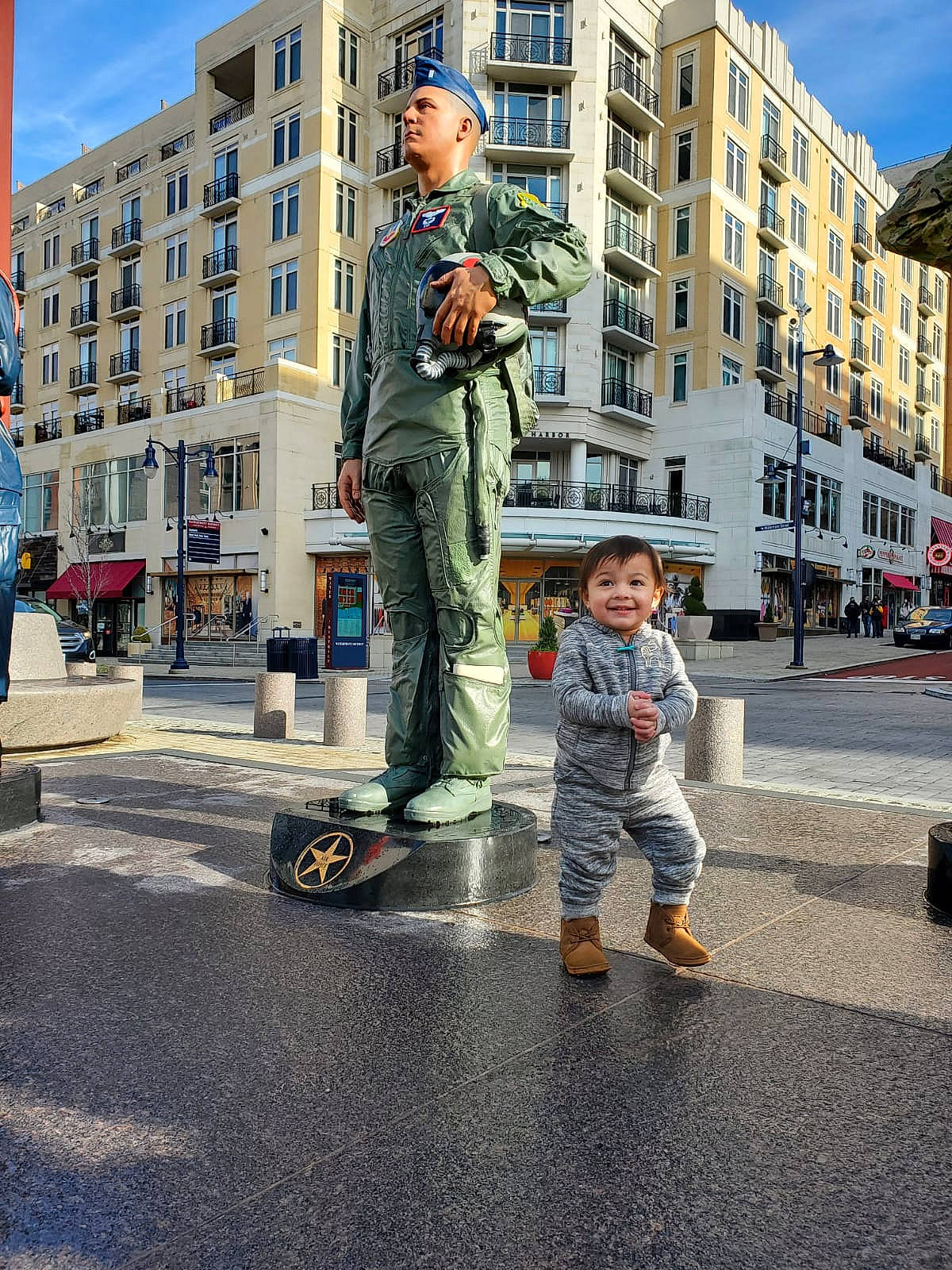 Clarissa joined the competition — help win amazing prizes! asphalt, building, camouflage, city, headwear, jacket, joy, marines, military_camouflage, military_officer, military_organization, military_person, military_uniform, person, road_surface, security, sky, soldier, standing, tire