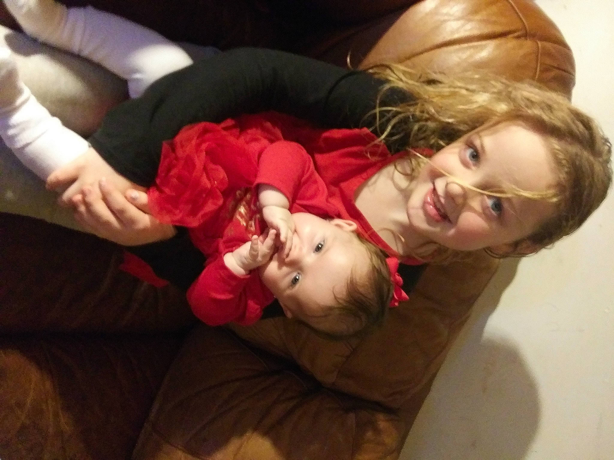 Izabell is registered to the contest to win money with this photo: baby, baby_toddler_clothing, cheek, child, comfort, couch, eye, human, joy, lap, laugh, lip, living_room, mouth, nose, person, tooth