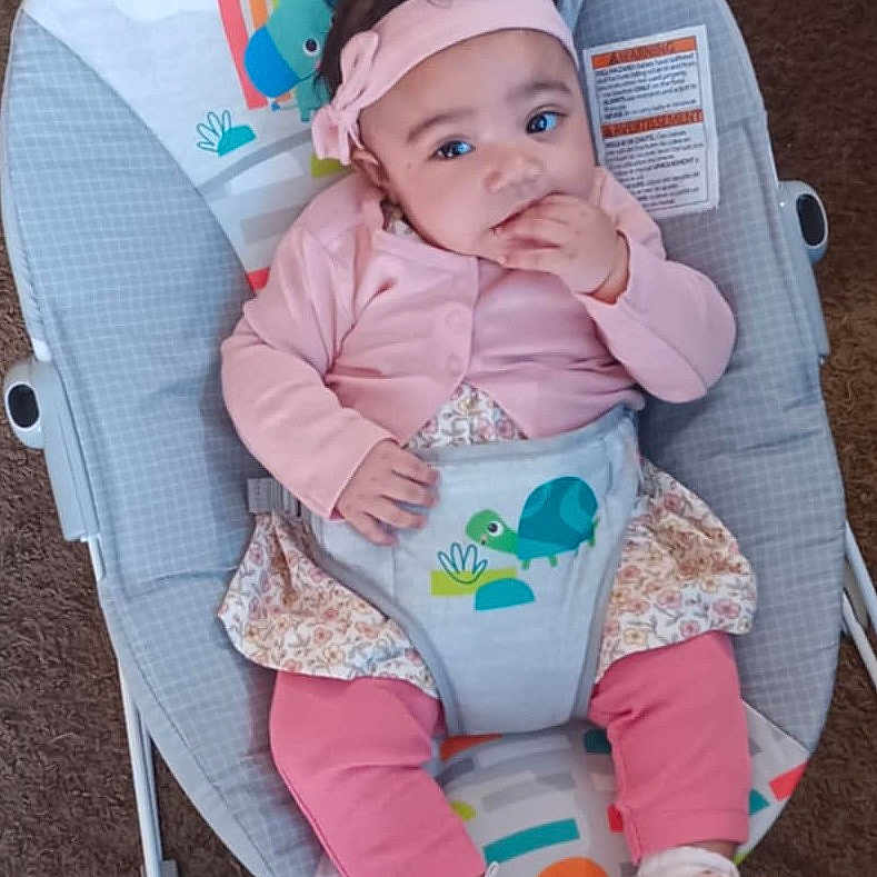 Nova joined the competition — help win amazing prizes! baby, clothing, face, footwear, hair, happy, head, infantbed, person, shoe, shorts, sitting, sleeve