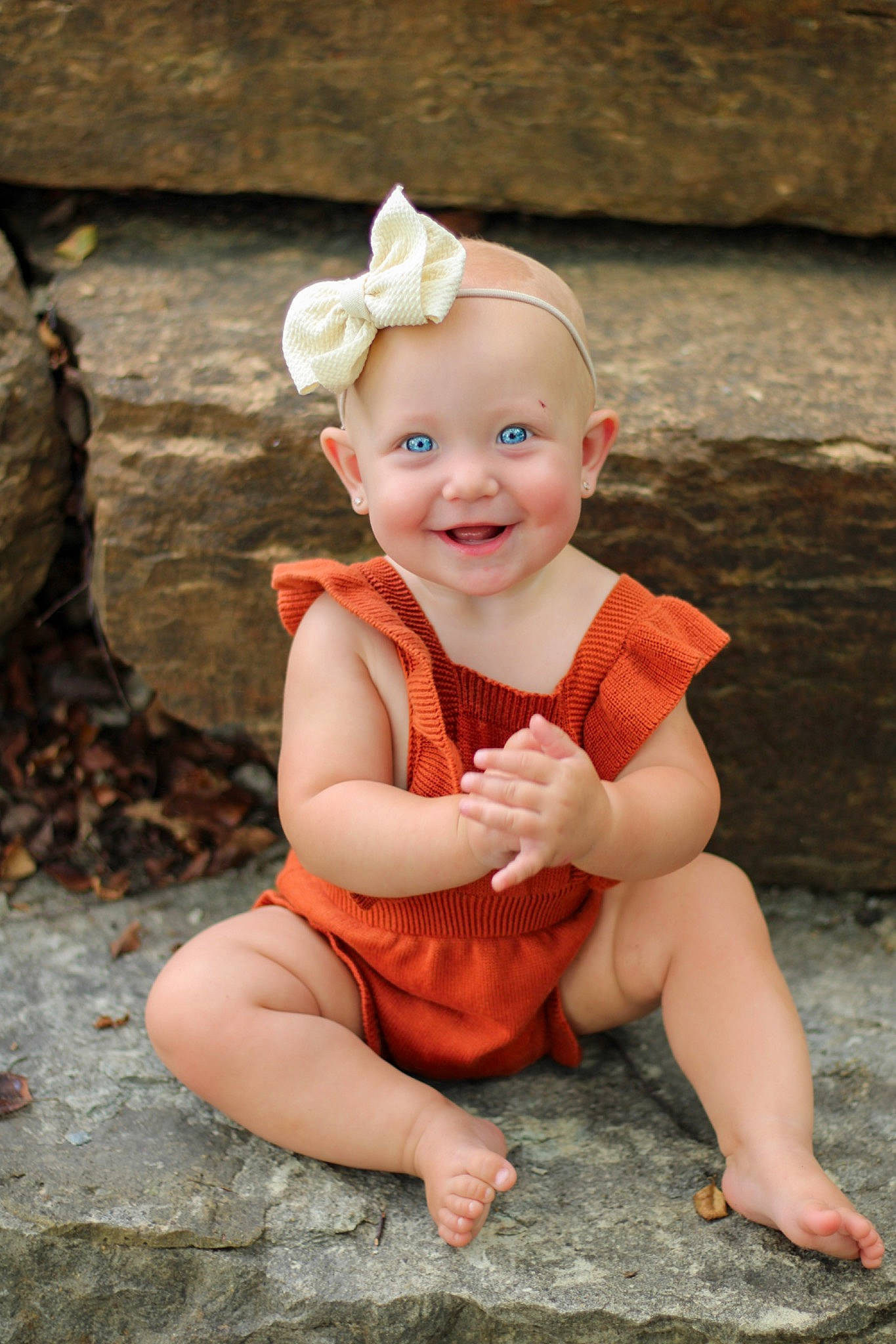 Penelope is registered to the contest to win money with this photo: baby, baby_toddler_clothing, beauty, child, eye, fashion_accessory, flash_photography, fun, grass, happy, headband, headpiece, headwear, joy, laugh, people_in_nature, person, pink, portrait_photography, sitting
