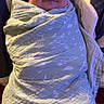 Kaige is registered to the contest to win money with this photo: baby, infant, smile, blanket, swaddle, bed, pillow, sleepy, cozy, child, soft, comfort, wrapped, peaceful, cute, resting, indoors, young, portrait, person