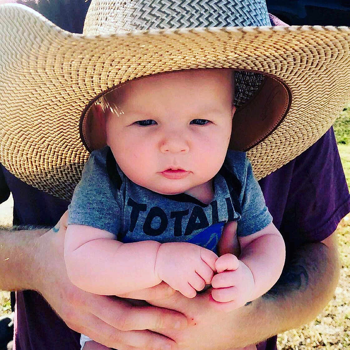Kolter joined the competition — help win amazing prizes! baby, child, clothing, cowboy_hat, fashion_accessory, finger, hand, hat, headgear, headwear, person, skin, sun_hat, toddler