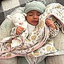 Luna joined the competition — help win amazing prizes! baby, sleeping, plush_toy, blanket, hat, cozy, child, infant, soft_toy, cushion, patterned, pastel_colors, cute, resting, peaceful, indoors, hand, clothing, portrait, comfort