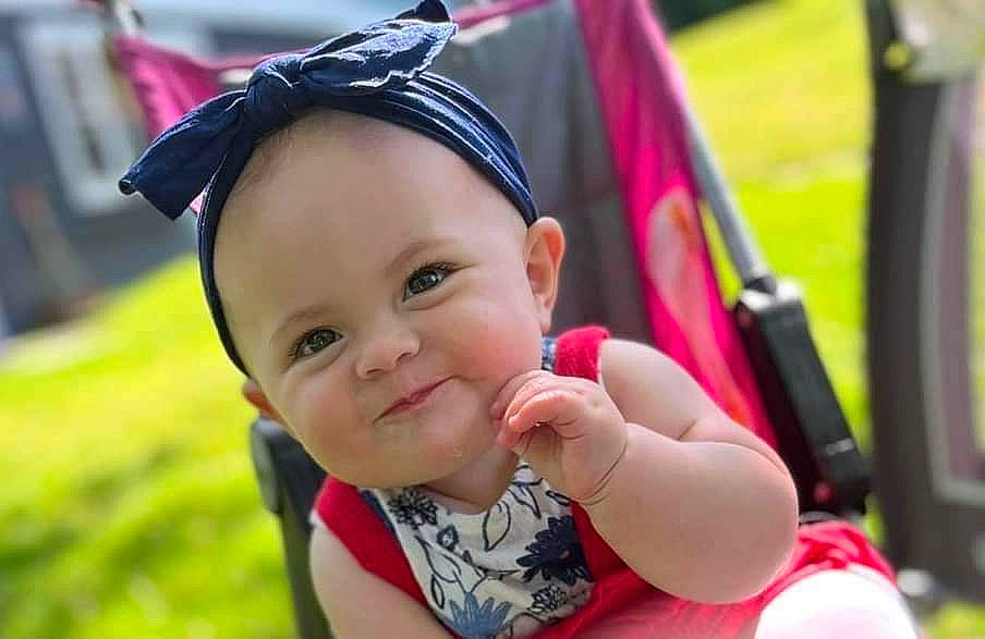 Madelynn joined the competition — help win amazing prizes! baby, baby_carriage, baby_toddler_clothing, beauty, child, event, facial_expression, fun, grass, happy, hat, joy, leisure, magenta, people, person, pink, plant, recreation, skin