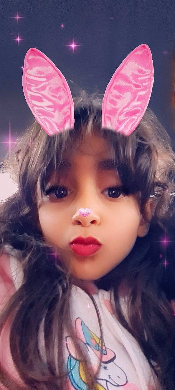 Maya a rejoint le concours — aidez-le/la à gagner de superbes lots ! bangs, black_hair, cap, child, cool, costume_hat, ear, eyelash, facial_expression, fashion, happy, headgear, headpiece, lip, magenta, organ, person, petal, pink, plant