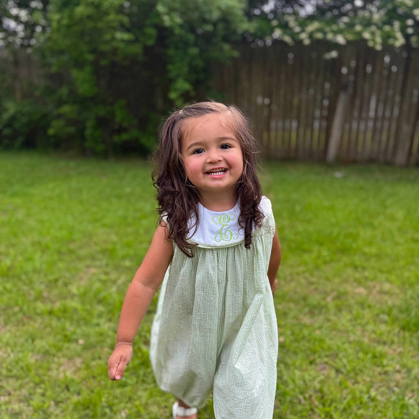 Vaylana joined the competition — help win amazing prizes! bushes, child, curly_hair, dress, fence, garden, girl, grass, green_grass, happy, nature, outdoor, person, playful, portrait, running, smiling, summer, sunlight, white_sandals