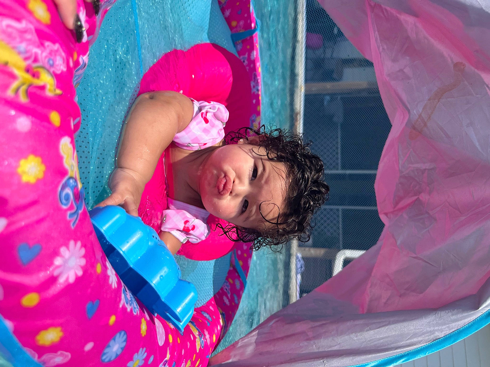 Vay is registered to the contest to win money with this photo: baby, baby_toddler_clothing, child, comfort, event, facial_expression, fun, happy, leisure, magenta, pattern, person, pink, play, purple, recreation, red, textile, toddler