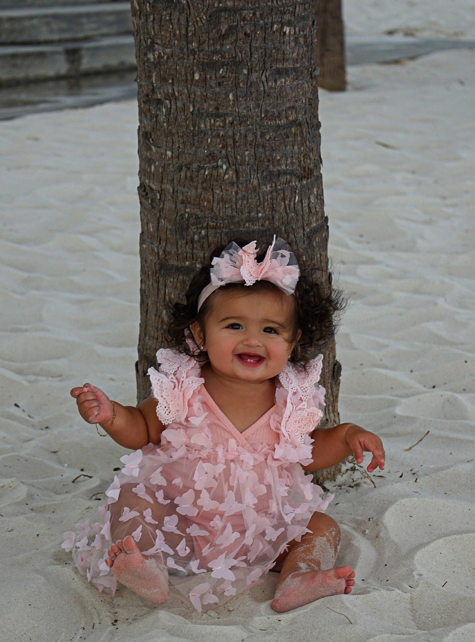 Vay is registered to the contest to win money with this photo: adaptation, baby_toddler_clothing, child, dress, embellishment, event, fashion_accessory, fun, hair_accessory, happy, headpiece, human_body, joy, leisure, pattern, people_in_nature, person, sitting, smile, toddler