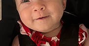 Alice Ophelia is registered to the contest to win money with this photo: baby, infant, car_seat, child, smile, face, red_clothing, straps, happy, portrait, young_child, cute, safety_harness, person, indoor, closeup, skin, hair, hands, seat