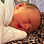 newborn, baby, sleeping, infant, face, lips, blanket, leopard_print, clothing, soft, cozy, closeup, peaceful, rest, skin, head, portrait, cute, child, person