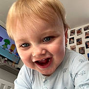 Hudson is registered to the contest to win money with this photo: baby, babylaughing, blonde, bodypart, computerhardware, electronics, face, happy, hardware, head, laughing, monitor, mouth, person, photography, portrait, screen, smile, teeth, tv