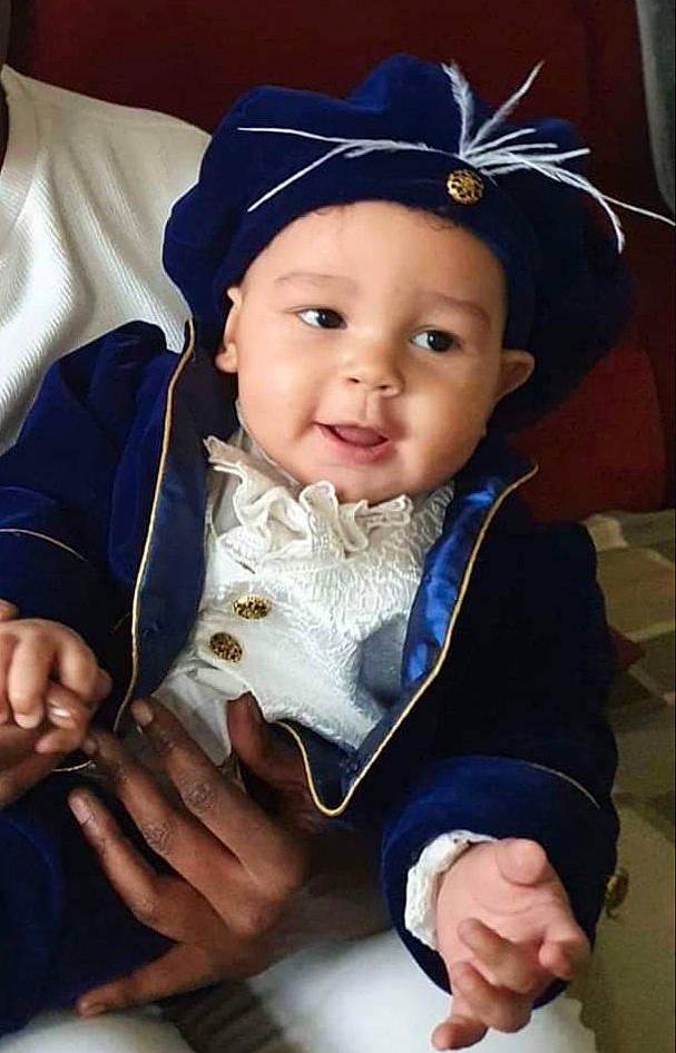 Armando joined the competition — help win amazing prizes! baby, child, finger, hand, headgear, headwear, person, smile, thumb, toddler