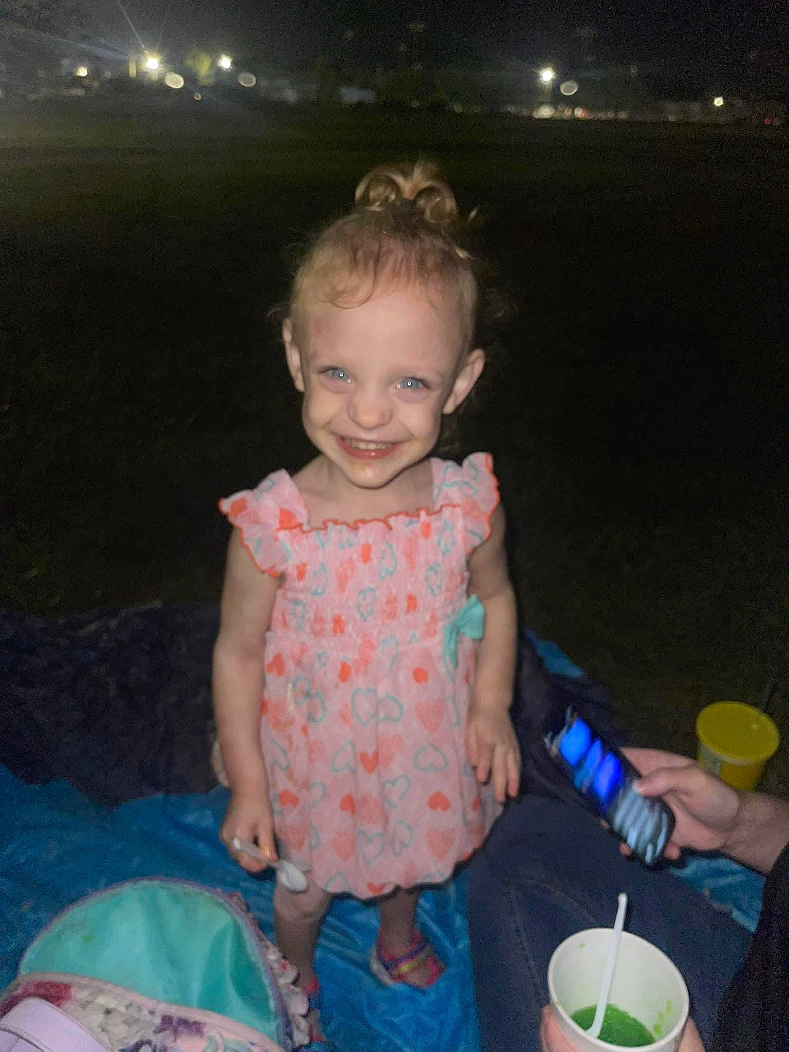 Kira joined the competition — help win amazing prizes! baby_toddler_clothing, bucket, child, event, flash_photography, fun, grass, happy, joy, leisure, party, party_supply, pattern, person, play, shorts, sitting, smile, standing, t_shirt