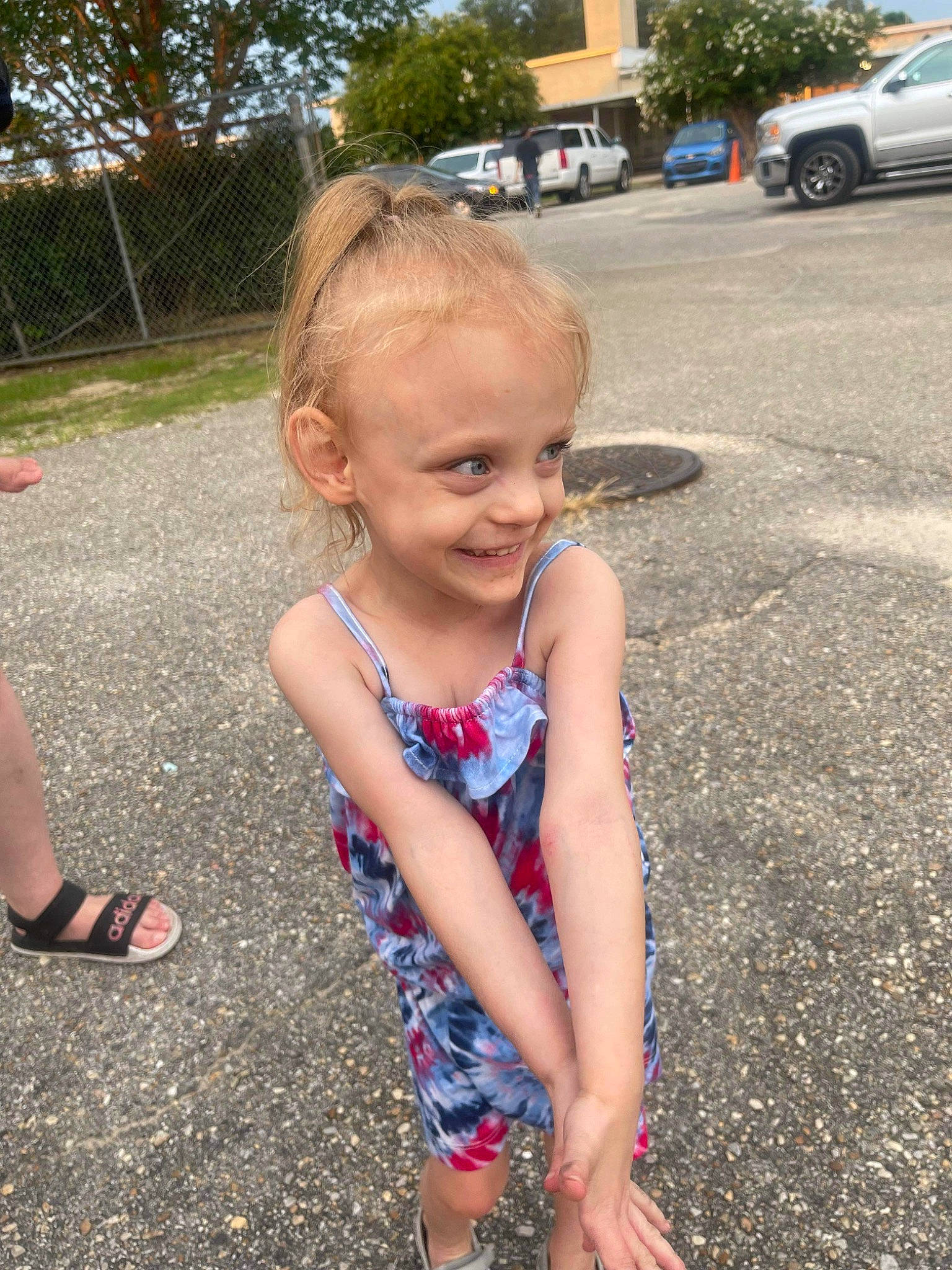 Kira joined the competition — help win amazing prizes! asphalt, car, child, facial_expression, fun, grass, hairstyle, happy, joy, leg, leisure, person, pink, public_space, recreation, road_surface, smile, summer, tire, toddler