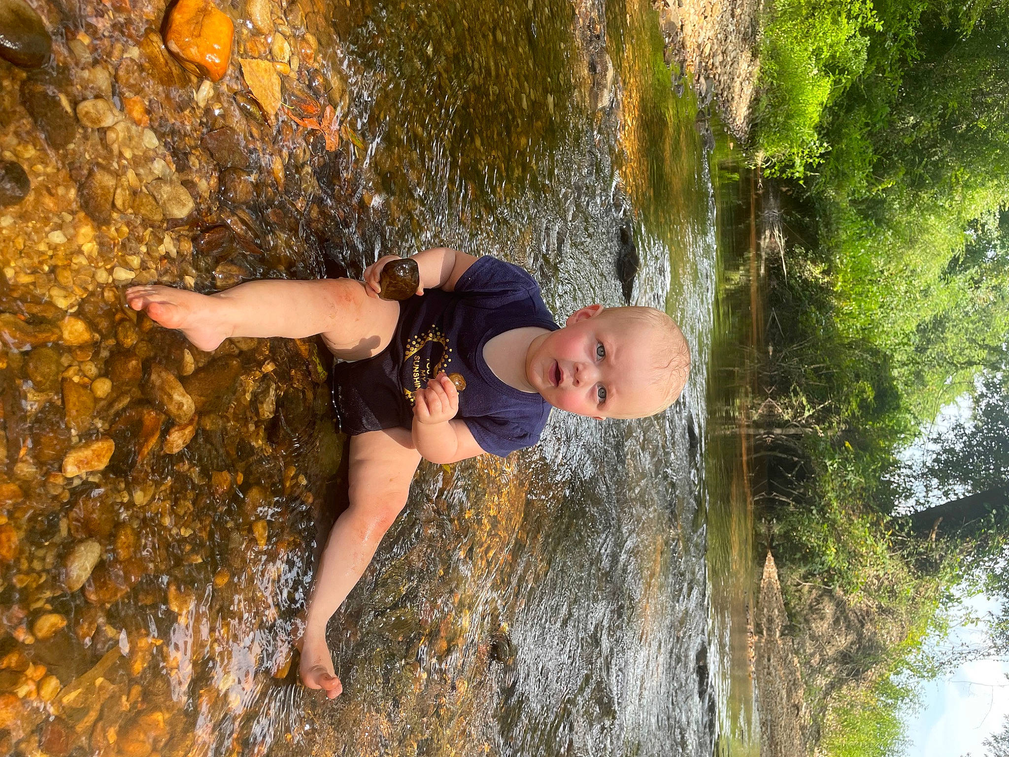 Cirilla is registered to the contest to win money with this photo: adventure, bedrock, formation, fun, geology, grass, happy, leaf, leisure, outdoor_recreation, people_in_nature, person, plant, recreation, rock, sport_climbing, tree, trunk, water_feature, wilderness