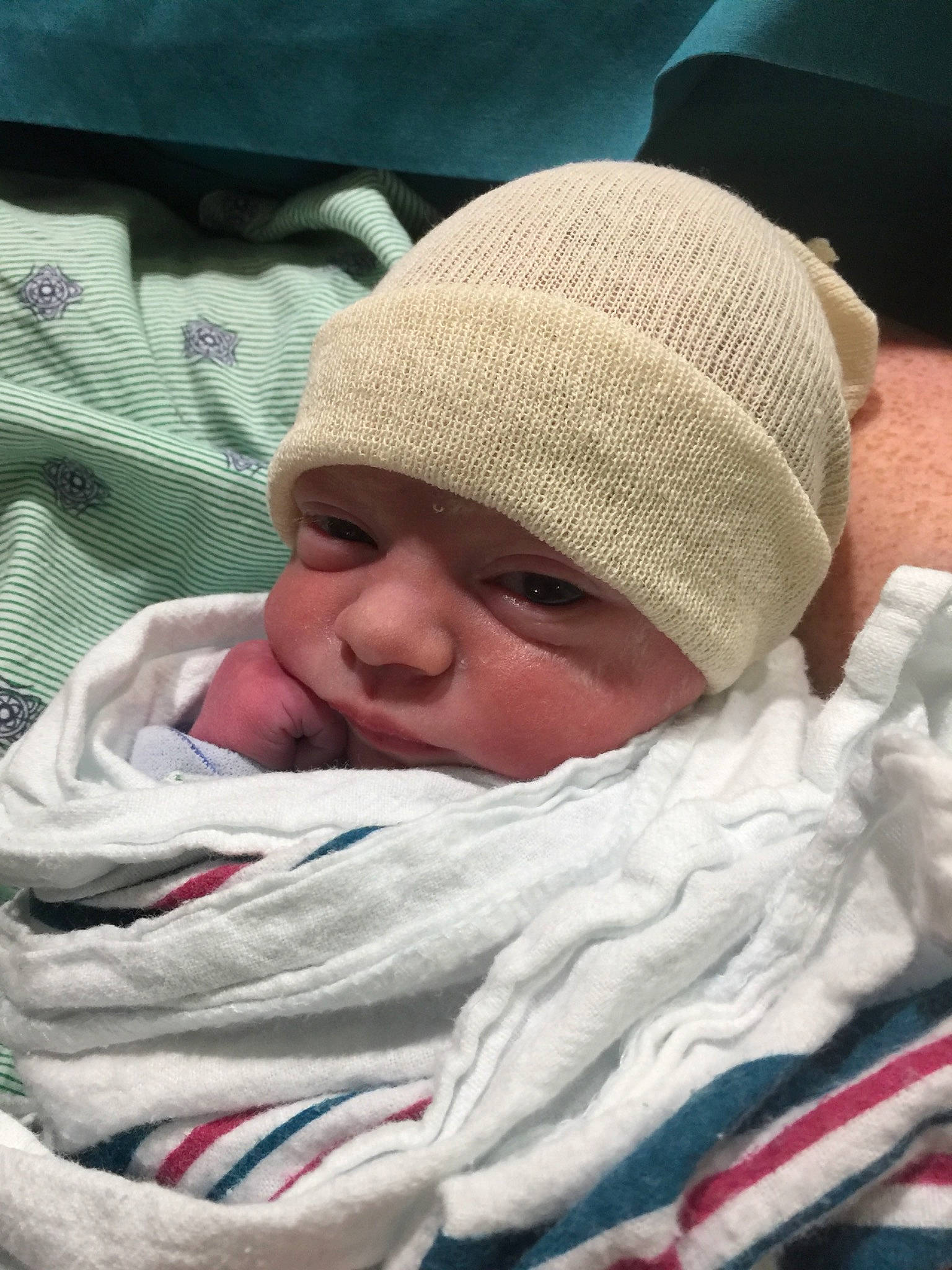 Lincoln is registered to the contest to win money with this photo: beanie, bonnet, cap, child, headgear, headwear, infant, knit_cap, knitting, person, product, textile, toddler, wool