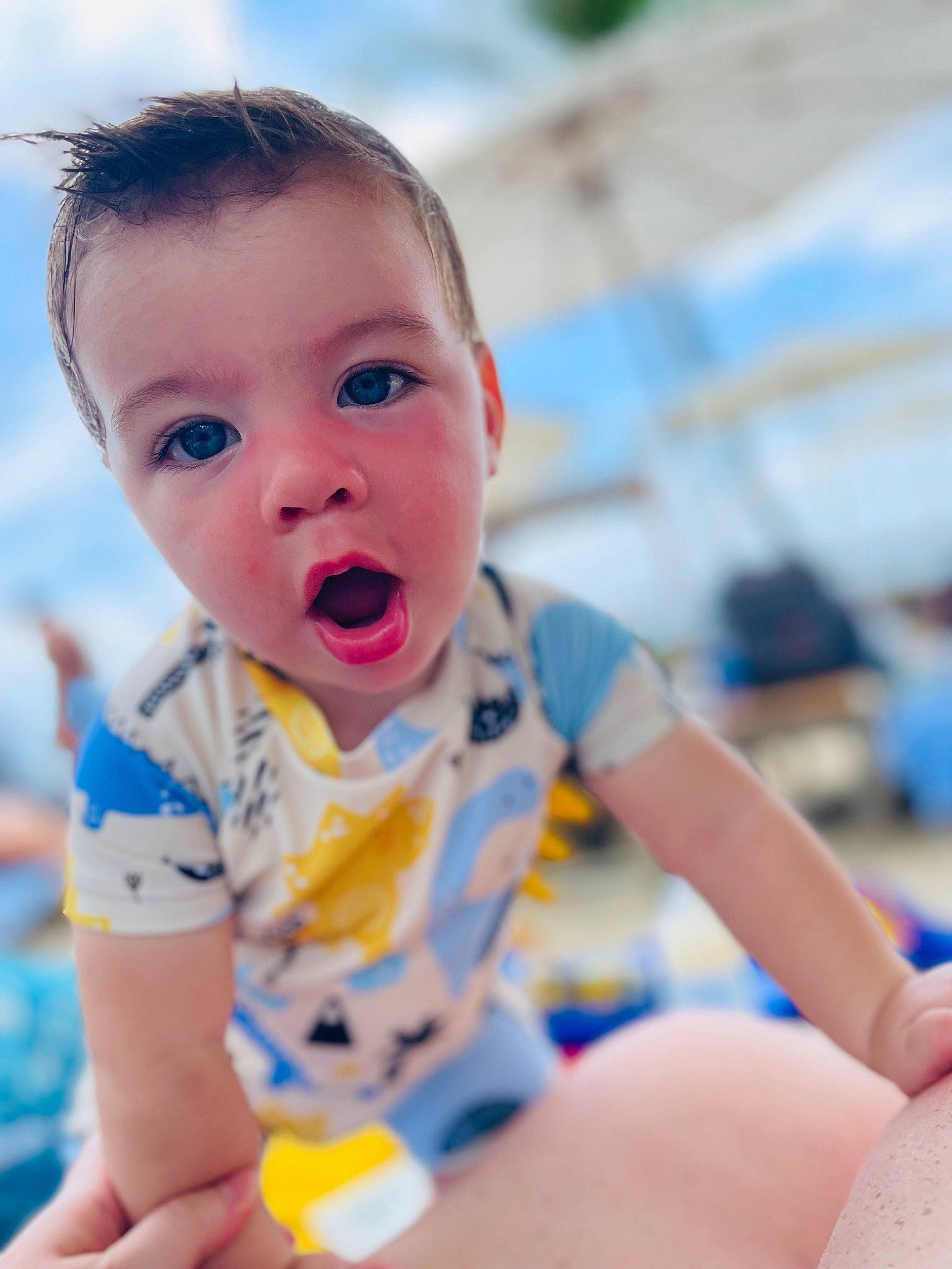 Jensen is registered to the contest to win money with this photo: azure, baby, baby_toddler_clothing, cheek, close_up, eye, fun, happy, human_body, human_leg, iris, joint, leisure, lip, mouth, nose, person, sitting, skin, sleeve