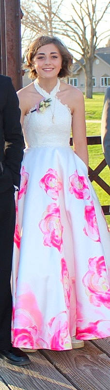 Danielle joined the competition — help win amazing prizes! bridal_party_dress, day_dress, embellishment, event, formal_wear, gesture, gown, human_leg, joy, knee, magenta, pattern, peach, person, petal, pink, shoulder, sleeve, thigh, waist