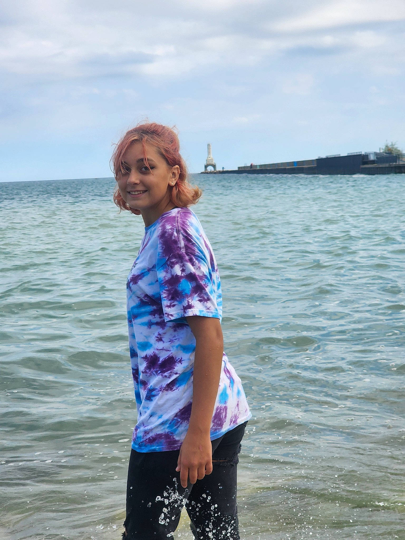 Danielle is registered to the contest to win money with this photo: cloud, electric_blue, fun, happy, horizon, joy, lake, leisure, pattern, people_in_nature, person, recreation, sky, sleeve, smile, thigh, travel, tree, waist, water