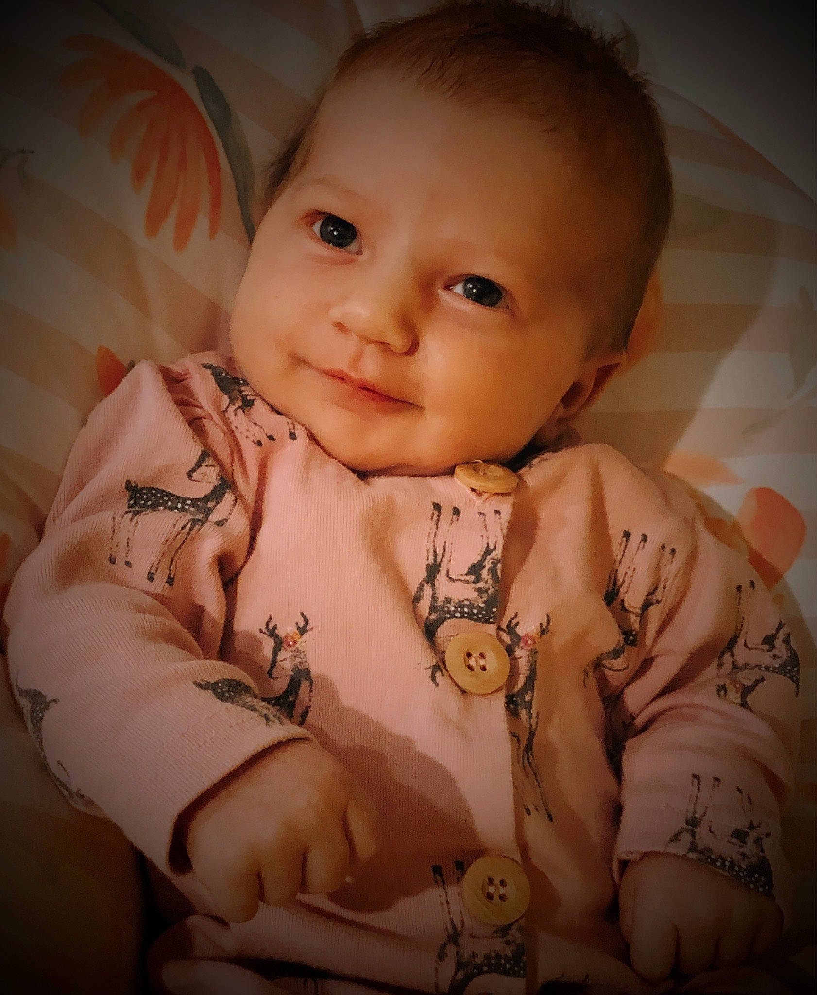 Emilee is registered to the contest to win money with this photo: baby, baby_toddler_clothing, cheek, dress, eyebrow, finger, flash_photography, hair, happy, human_body, iris, lip, mouth, neck, nose, person, skin, sleeve, smile, stomach