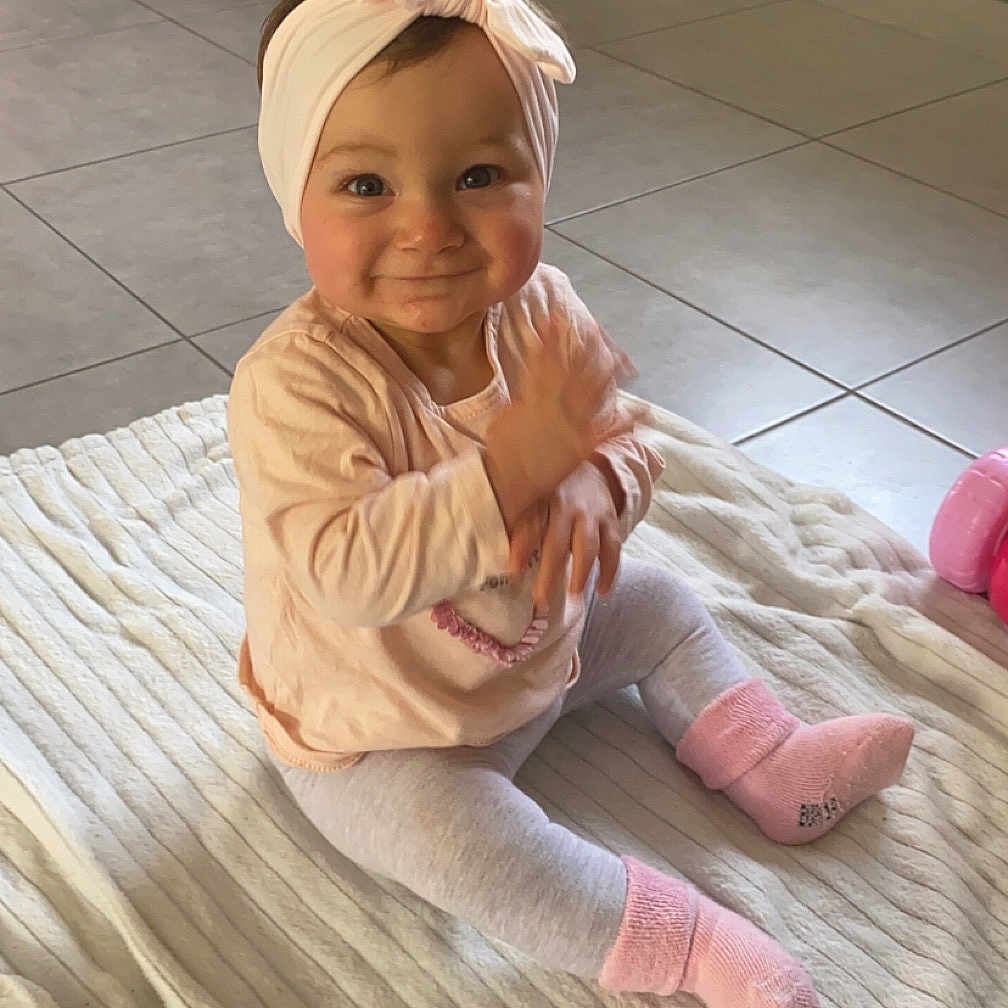 Jade participe au concours pour gagner de l'argent avec cette photo : appliance, baby, bodypart, clothing, costume, device, electricaldevice, face, finger, hand, hat, head, hosiery, pants, person, photography, portrait, sitting, sock, washer