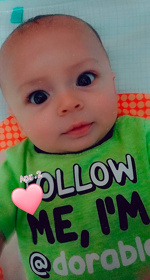 Dj is registered to the contest to win money with this photo: baby_toddler_clothing, cheek, chin, eye, eyebrow, eyelash, face, facial_expression, forehead, hairstyle, head, human, lip, mouth, nose, organ, outerwear, person, product, shirt