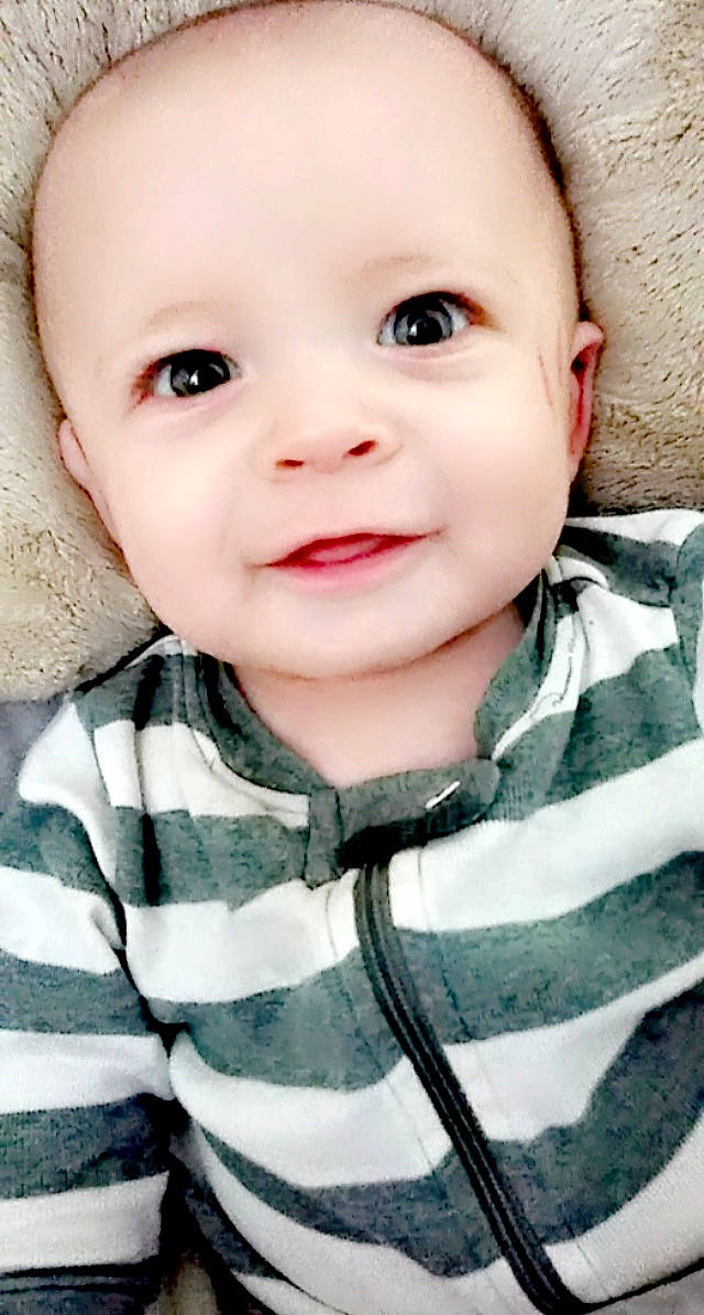 Dj is registered to the contest to win money with this photo: baby, baby_toddler_clothing, cheek, chin, clothing, collar, cool, eyelash, flash_photography, iris, lip, neck, nose, outerwear, person, photograph, skin, sleeve, smile, standing