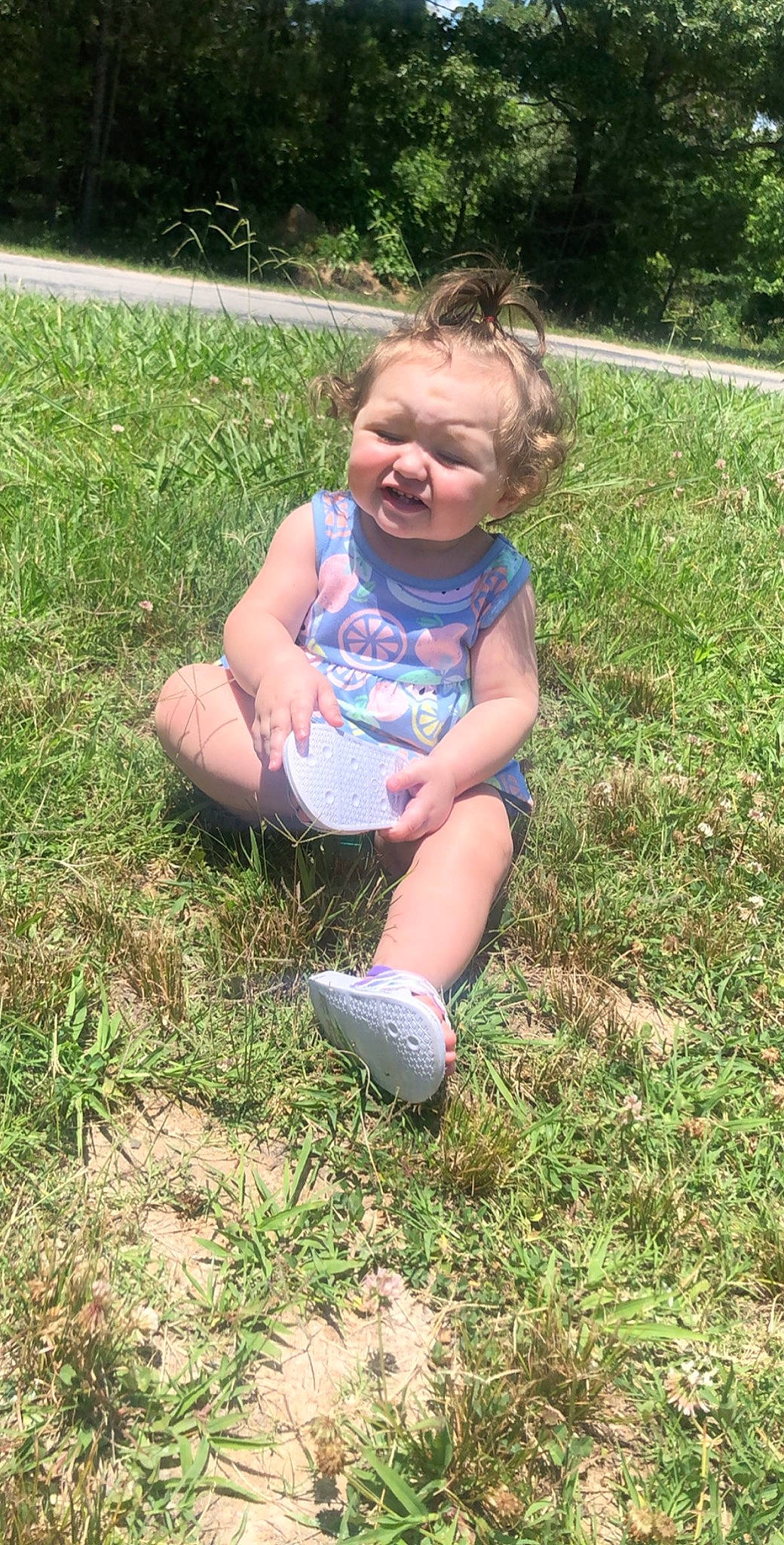 Kathryn is registered to the contest to win money with this photo: child, fun, grass, grass_family, lawn, meadow, person, plant, play, sitting, smile, soil, toddler