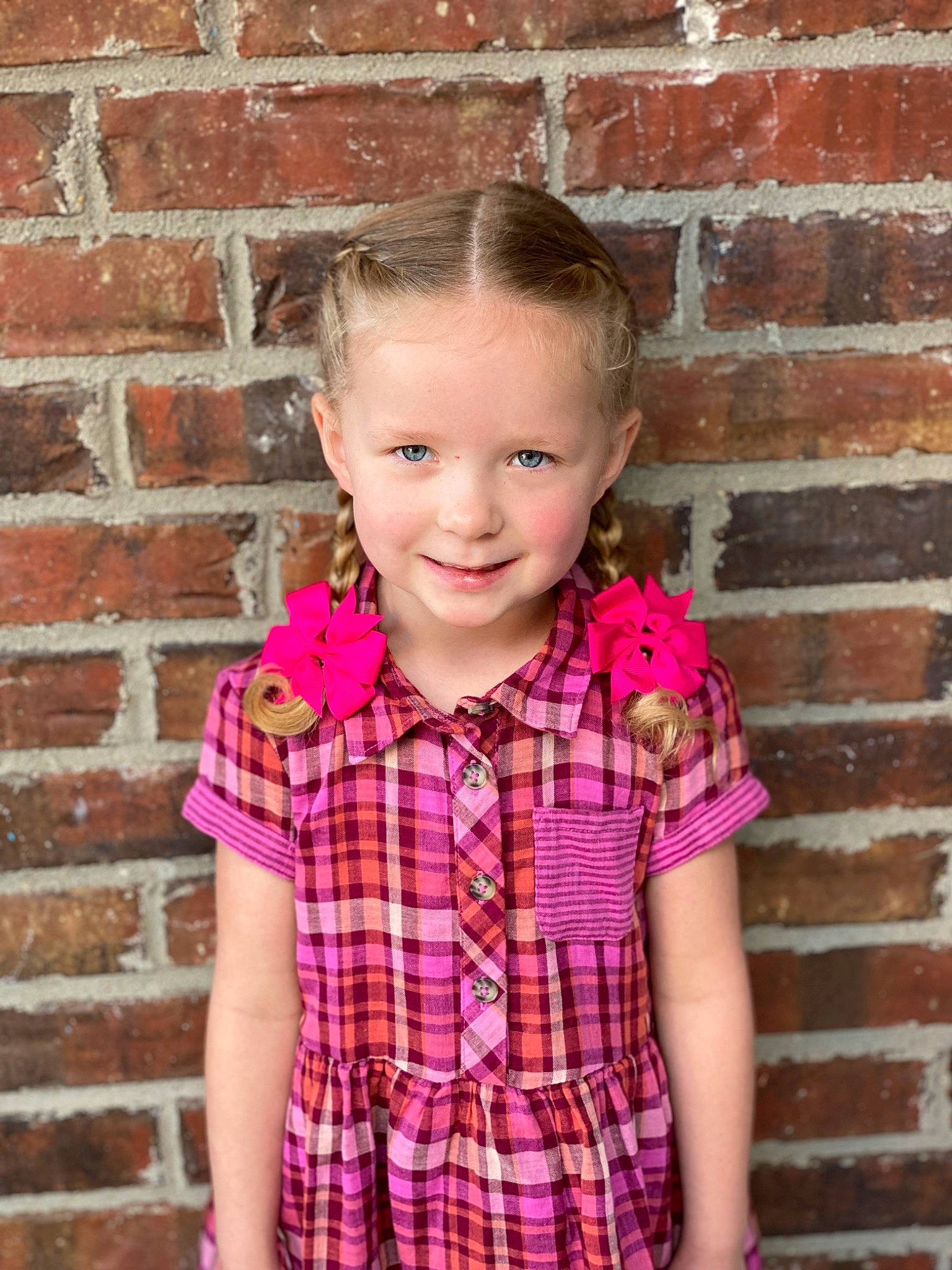 Brinn-leigh joined the competition — help win amazing prizes! brick, brickwork, dress_shirt, eye, face, fashion, flash_photography, hair, happy, head, joy, neck, outerwear, person, pink, plant, purple, shirt, sleeve, smile