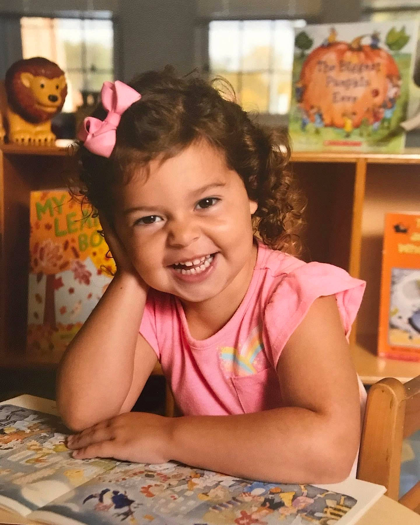 Ruby joined the competition — help win amazing prizes! baby, birthday, chair, cheek, child, desk, event, fun, happy, joy, leisure, party, people, person, pink, play, room, sitting, smile, t_shirt