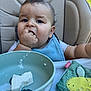 Izaac a rejoint le concours — aidez-le/la à gagner de superbes lots ! baby, child, high_chair, blue_eyes, food, hand, face, furniture, feeding, bib, plate, toy, plush_toy, expression, indoor, person, clothing, skin, mouth, table