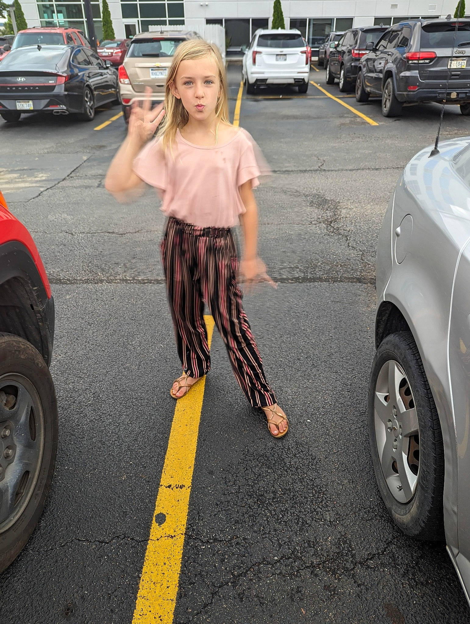 Alexandra joined the competition — help win amazing prizes! asphalt, automotive_exterior, automotive_lighting, automotive_tire, car, eyewear, gesture, hair, land_vehicle, leg, motor_vehicle, person, road, road_surface, sidewalk, thigh, tire, vehicle, vehicle_door, waist