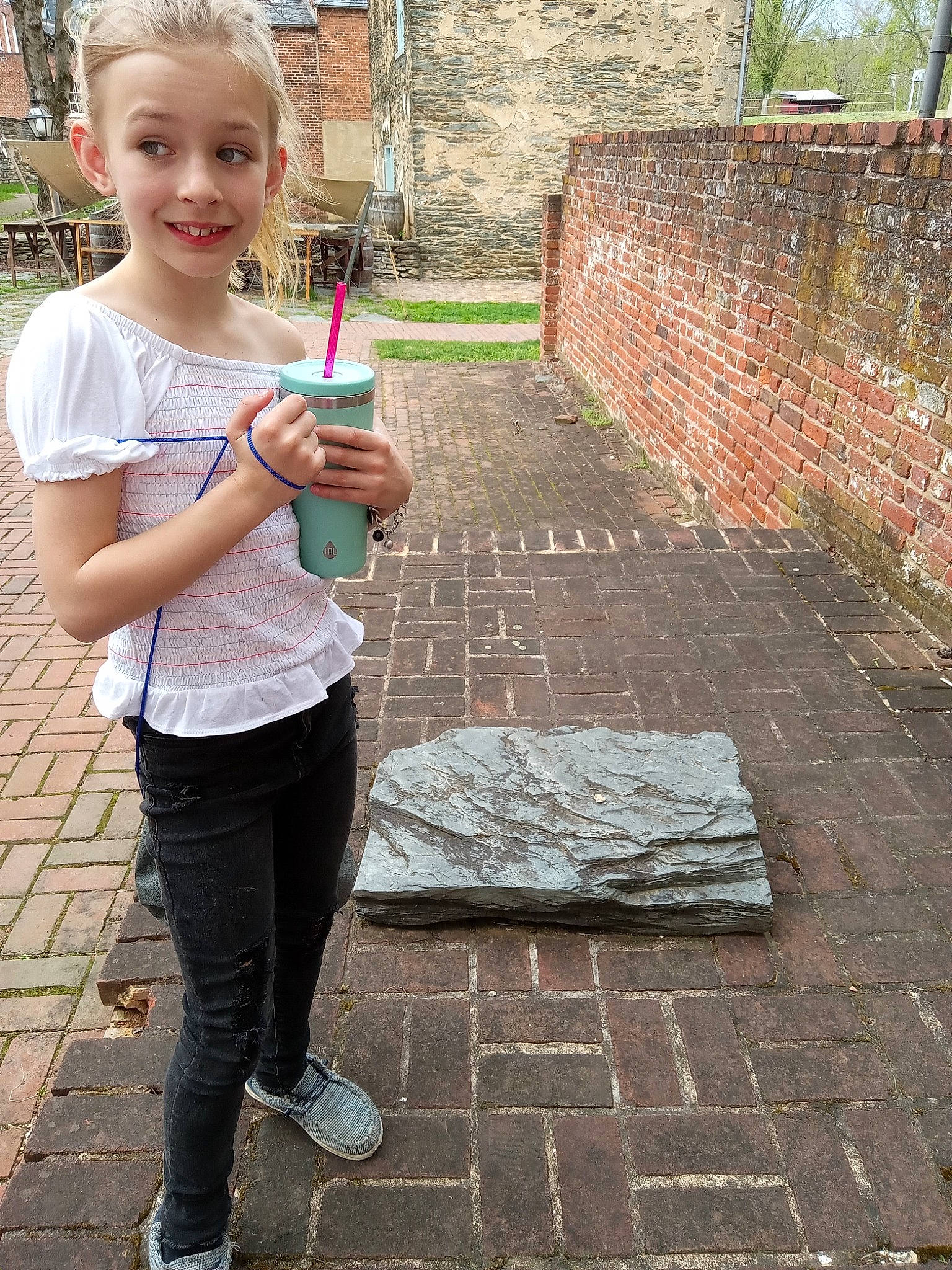 Alexandra joined the competition — help win amazing prizes! brick, brickwork, child, city, flooring, fun, grass, happy, human_leg, joy, leisure, magenta, person, pink, plant, road_surface, sidewalk, smile, street, t_shirt