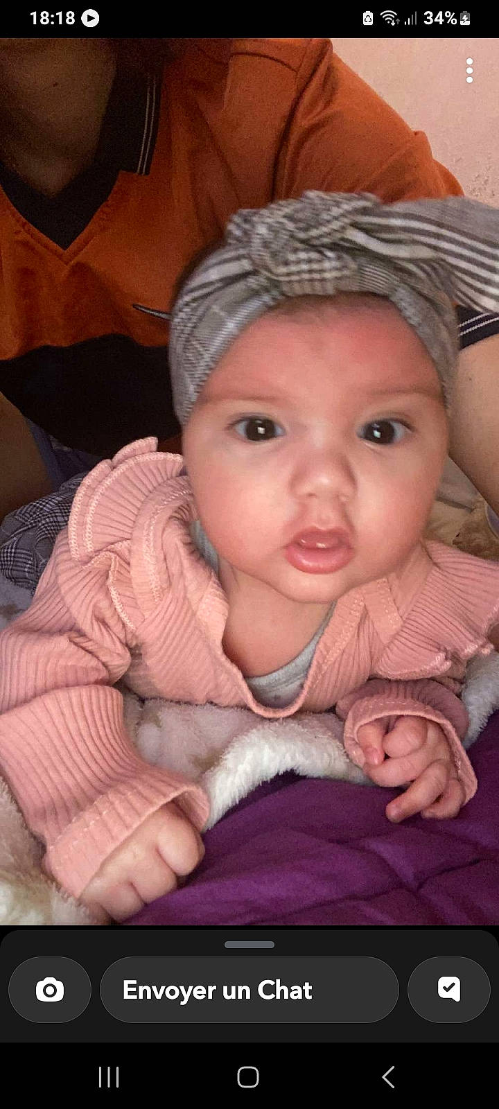 Luna participe au concours pour gagner de l'argent avec cette photo : baby, baby_toddler_clothing, cap, cheek, child, comfort, eye, eyebrow, eyelash, gesture, happy, headwear, human_body, iris, lip, mouth, nose, person, pink, skin