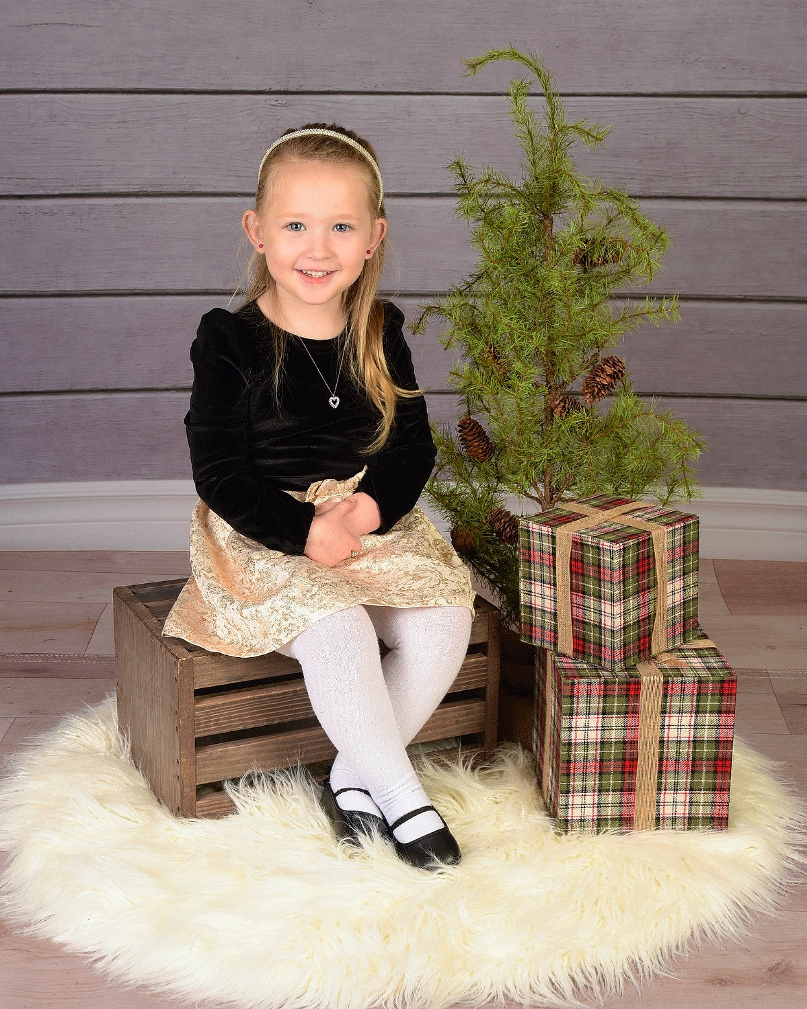 Evelyn joined the competition — help win amazing prizes! blond, boot, event, fawn, flash_photography, human_leg, joy, knee, leg, mammal, pattern, person, plaid, plant, sitting, smile, sock, standing, tartan, textile