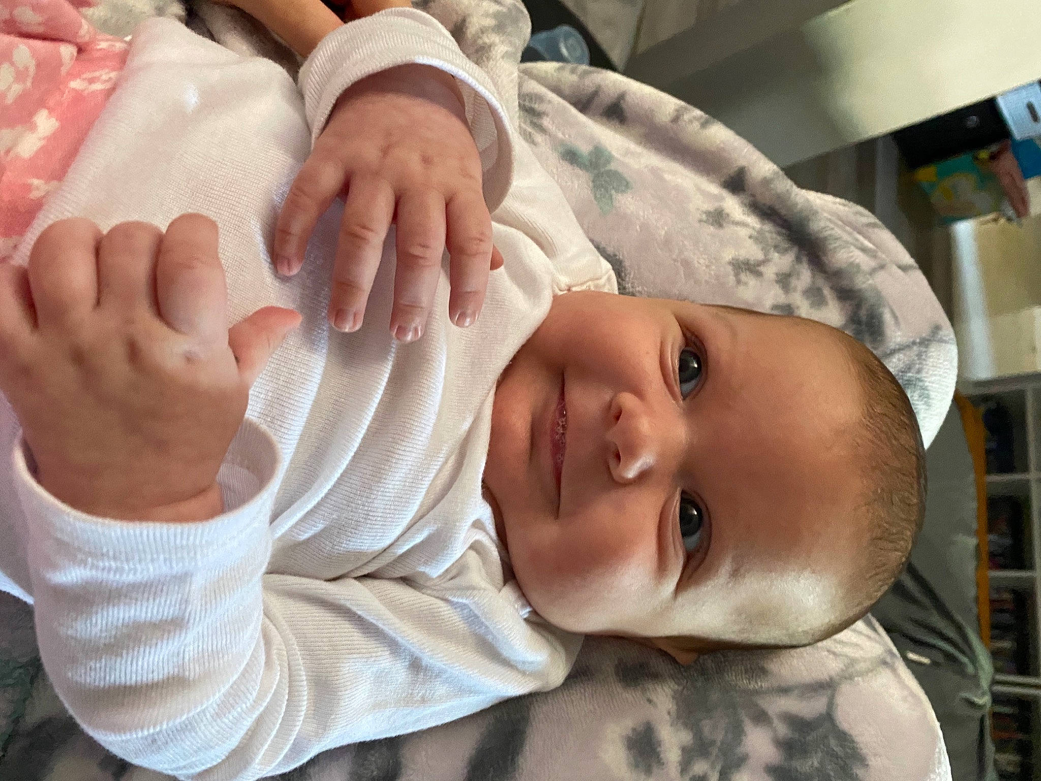 Sylvia is registered to the contest to win money with this photo: baby, birth, cheek, child, ear, finger, hand, joy, mouth, nose, person, skin, smile, toddler