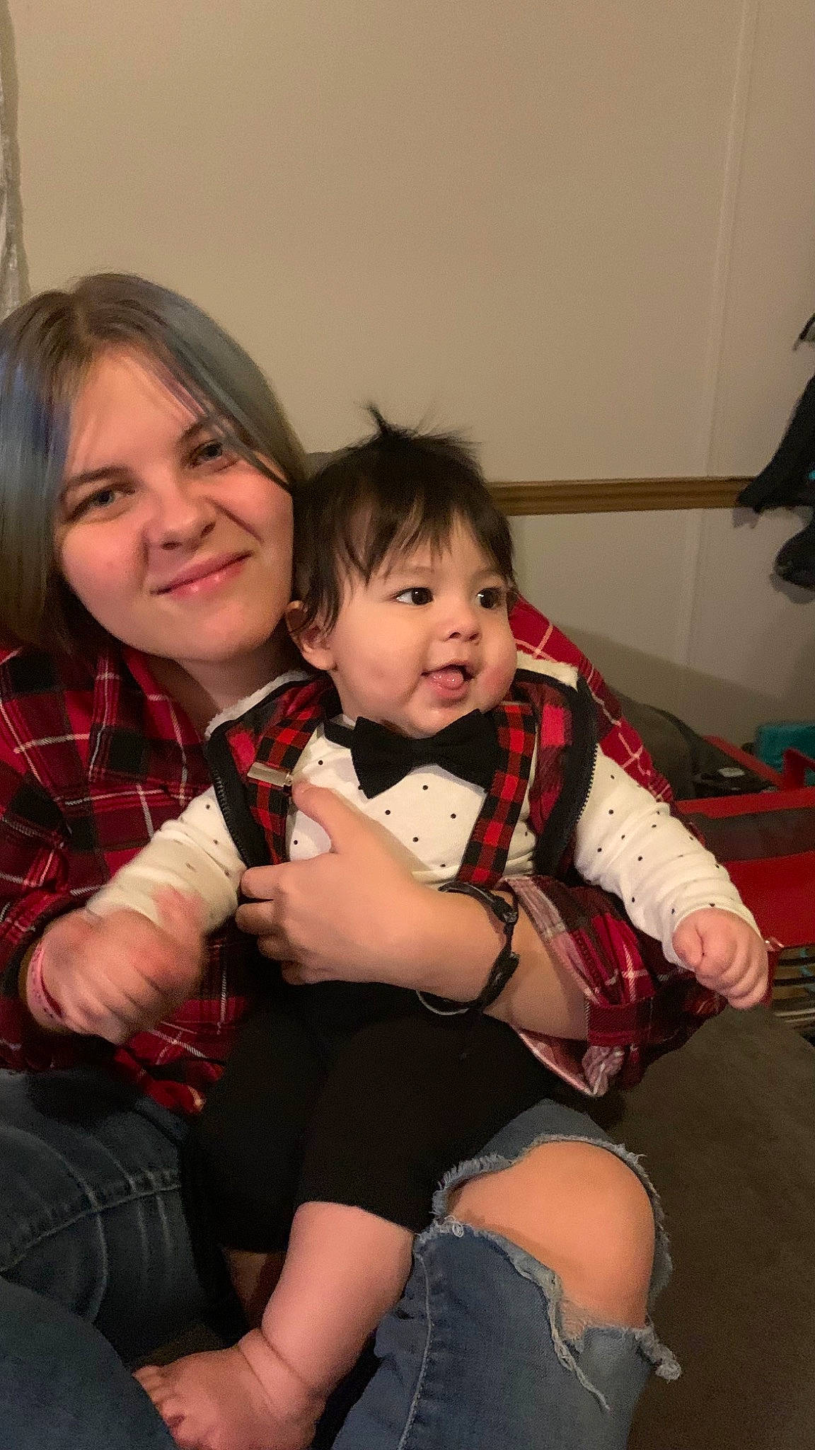 Miguel is registered to the contest to win money with this photo: baby, cheek, child, clothing, comfort, event, eye, finger, fun, happy, human_leg, iris, joy, lap, mouth, person, sitting, skin, smile, thigh