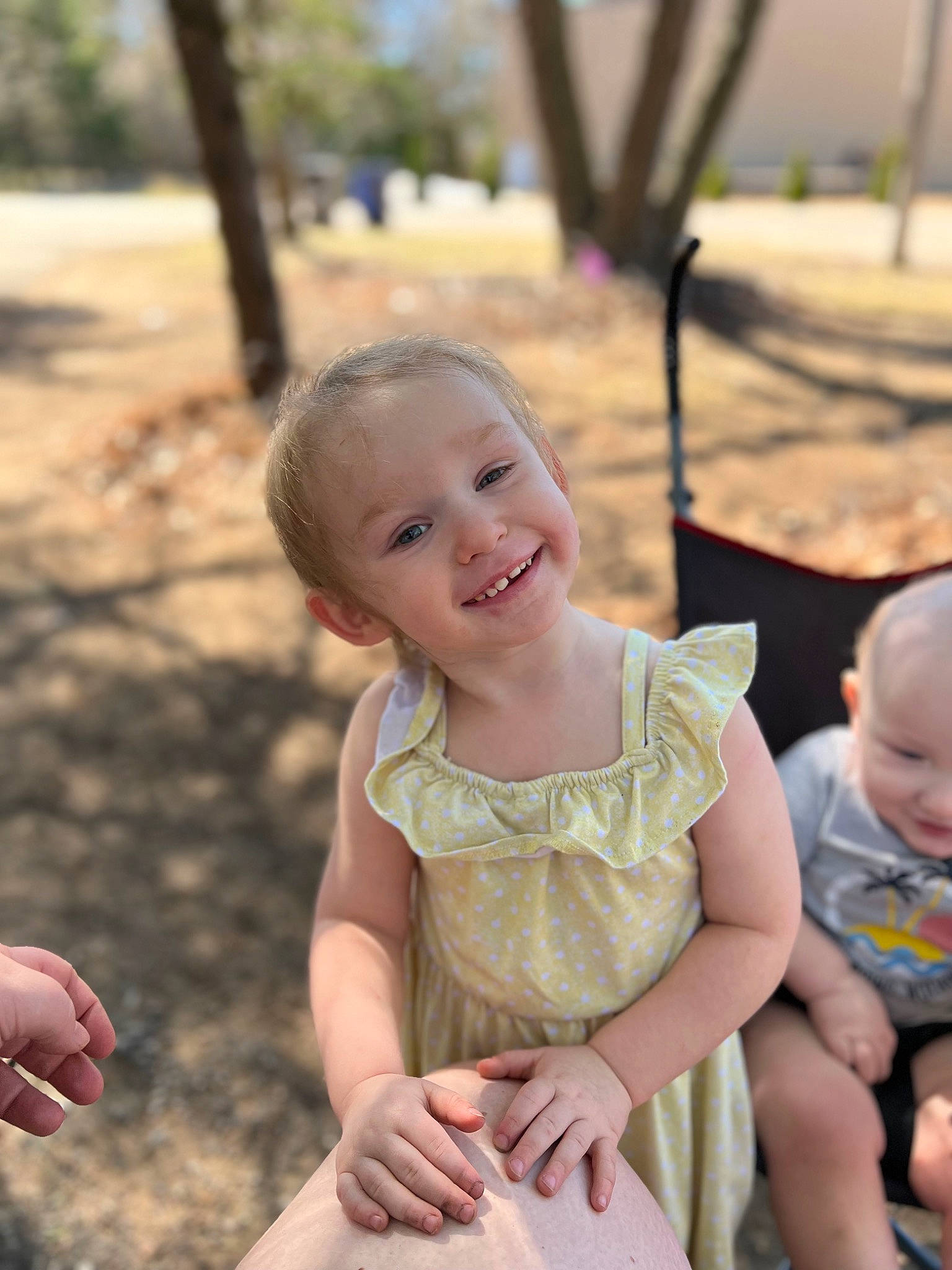 Isabella is registered to the contest to win money with this photo: baby, beauty, child, dress, face, flash_photography, fun, grass, hair, hairstyle, happy, joy, leisure, people, person, photograph, recreation, skin, smile, snapshot