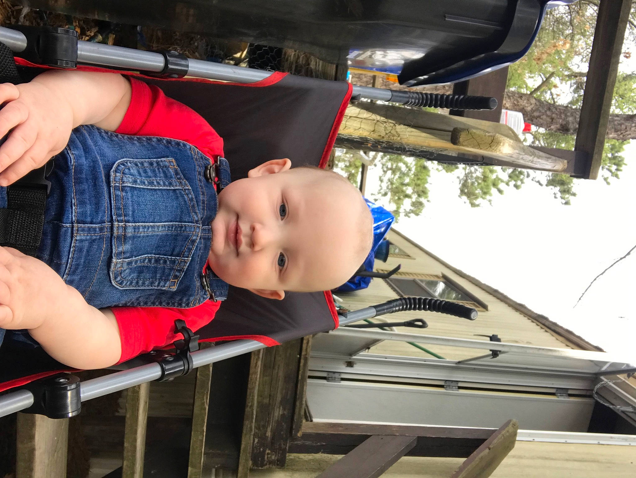 Lance is registered to the contest to win money with this photo: auto_part, automotive_design, automotive_exterior, automotive_mirror, automotive_window_part, bumper, child, denim, electric_blue, family_car, fun, joy, luxury_vehicle, motor_vehicle, person, smile, t_shirt, toddler, tree, vehicle