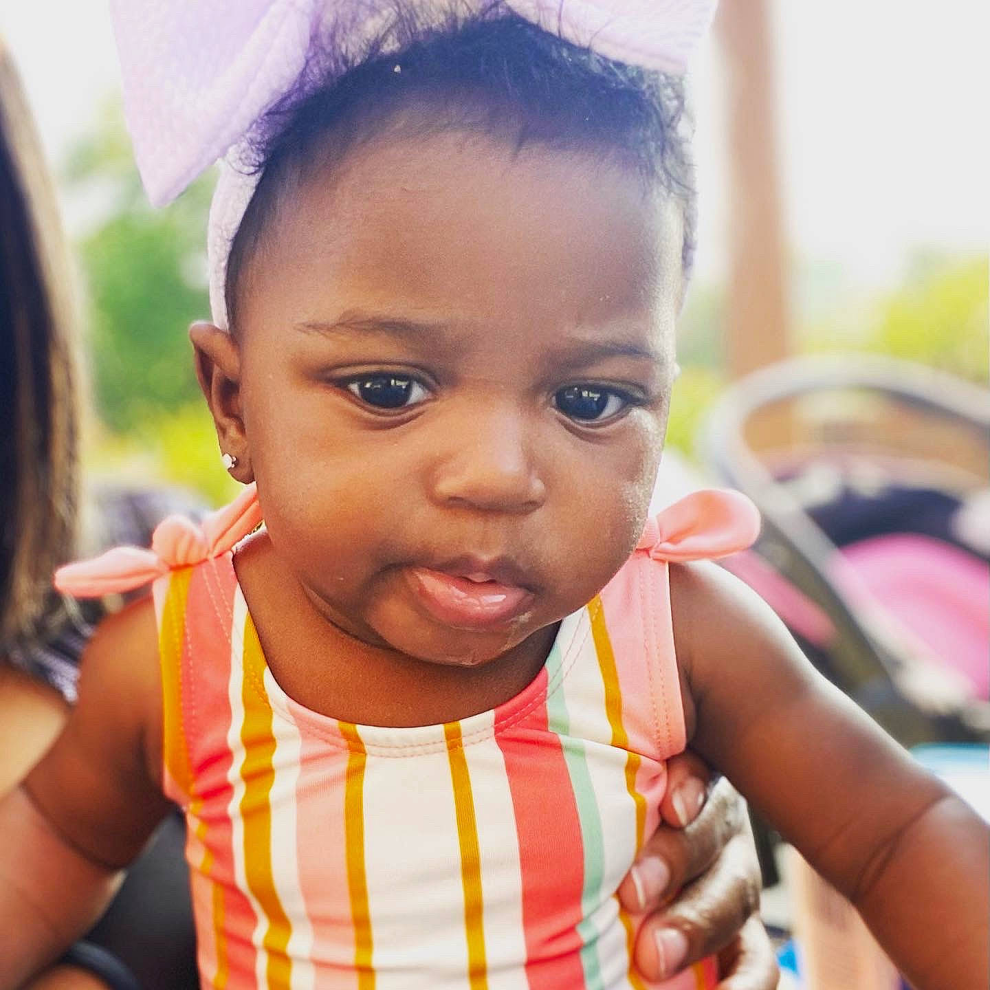 Brooklyn is registered to the contest to win money with this photo: adaptation, baby_toddler_clothing, black_hair, cheek, child, chin, dress, ear, eyebrow, eyelash, facial_expression, forehead, happy, human, iris, lip, nose, person, skin, temple