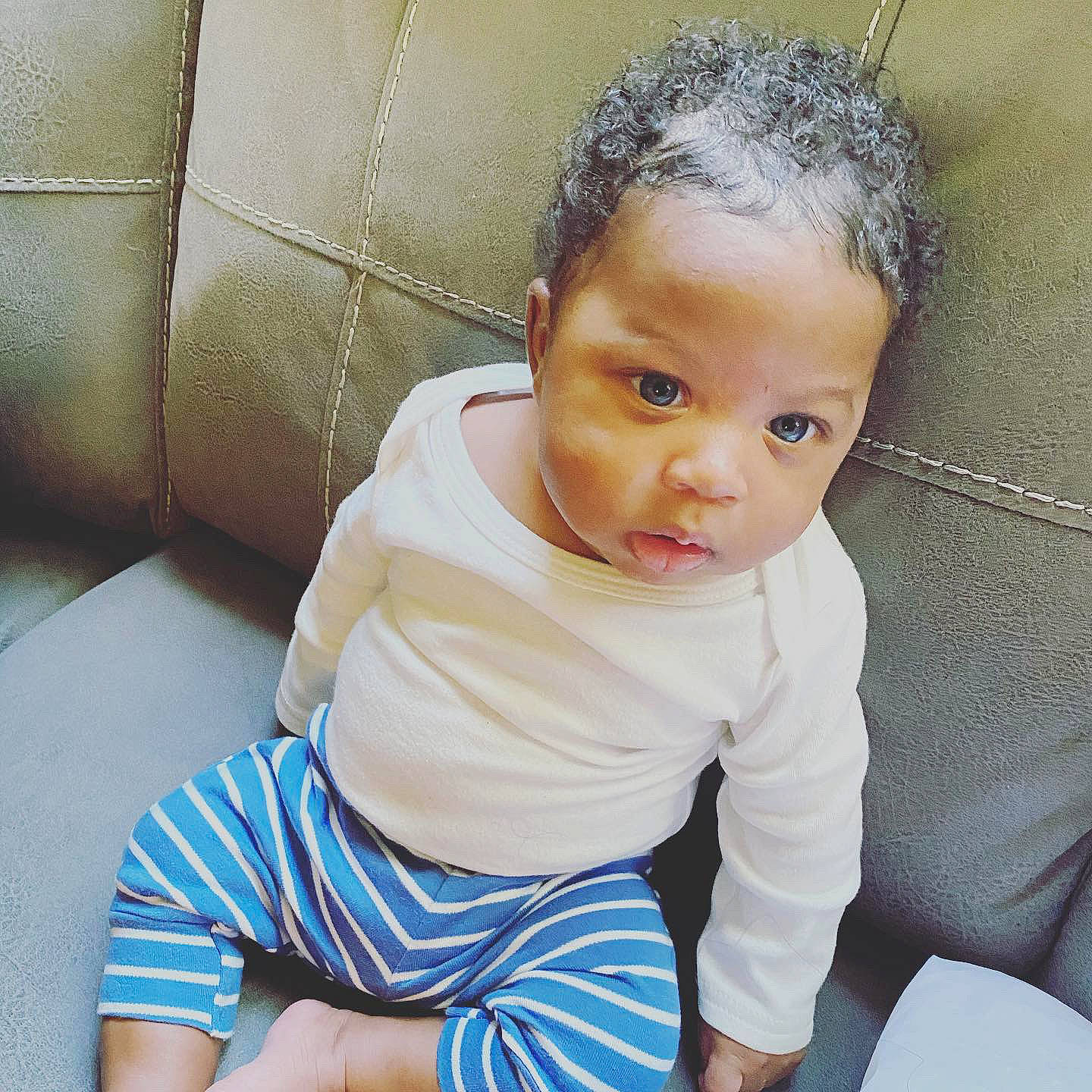 Braylen is registered to the contest to win money with this photo: baby, baby_toddler_clothing, child, chin, comfort, elbow, electric_blue, eye, eyelash, flooring, happy, human_leg, knee, nose, person, skin, sleeve, t_shirt, thigh, toddler