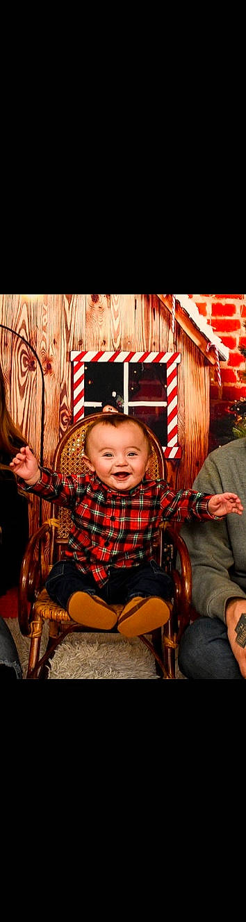 Dominic joined the competition — help win amazing prizes! black, chair, child, event, facial_expression, fun, hairstyle, hand, happy, joy, leisure, person, photograph, plaid, red, skin, smile, snapshot, tartan, toddler