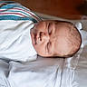 Lyric joined the competition — help win amazing prizes! newborn, baby, sleeping, swaddled, blanket, hospital, infant, bed, white_sheet, face, peaceful, resting, portrait, skin, head, child, young, cozy, sleep, indoors