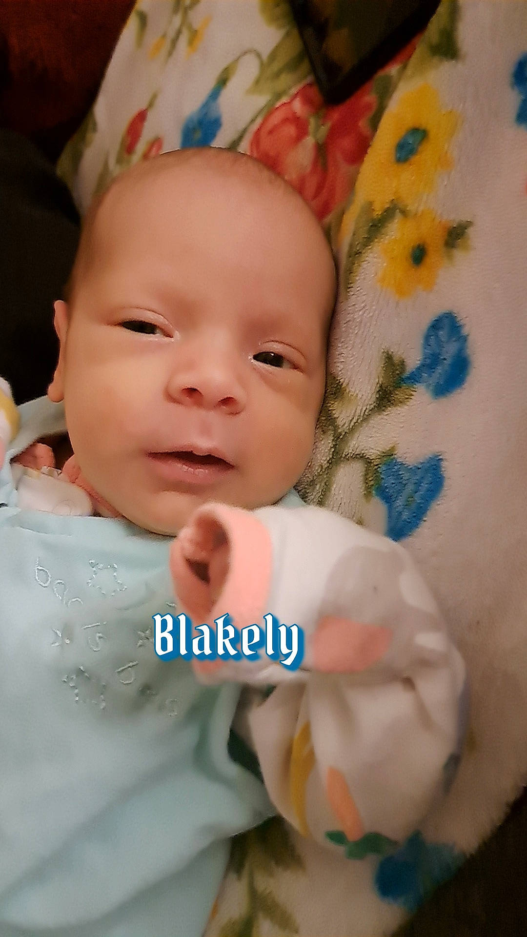 Blakely is registered to the contest to win money with this photo: baby, baby_products, baby_toddler_clothing, cheek, child, facial_expression, gesture, happy, iris, linens, nail, pattern, person, petal, portrait_photography, skin, smile, textile, thumb, toddler