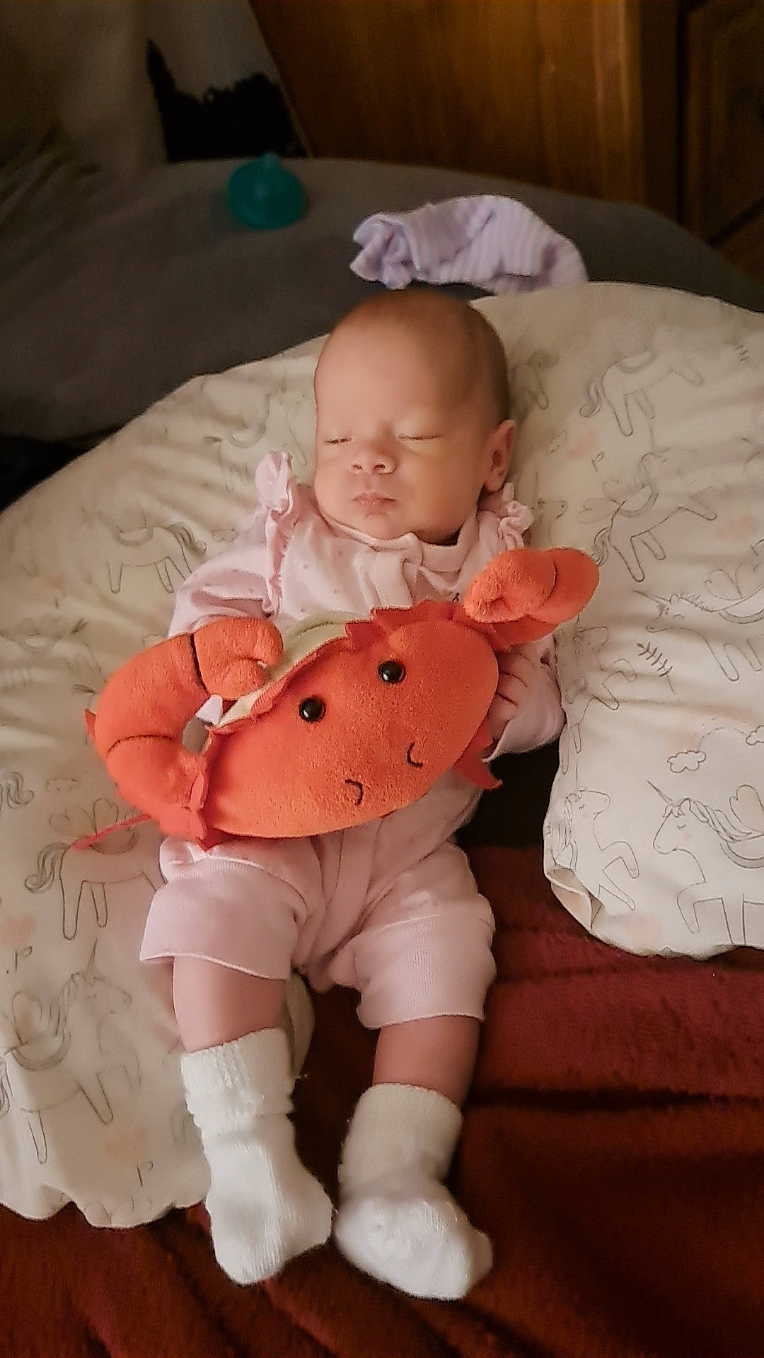 Blakely joined the competition — help win amazing prizes! baby, baby_toddler_clothing, cheek, child, comfort, finger, linens, orange, peach, person, pink, plush, room, sitting, skin, sleeve, stuffed_toy, textile, thigh, toddler