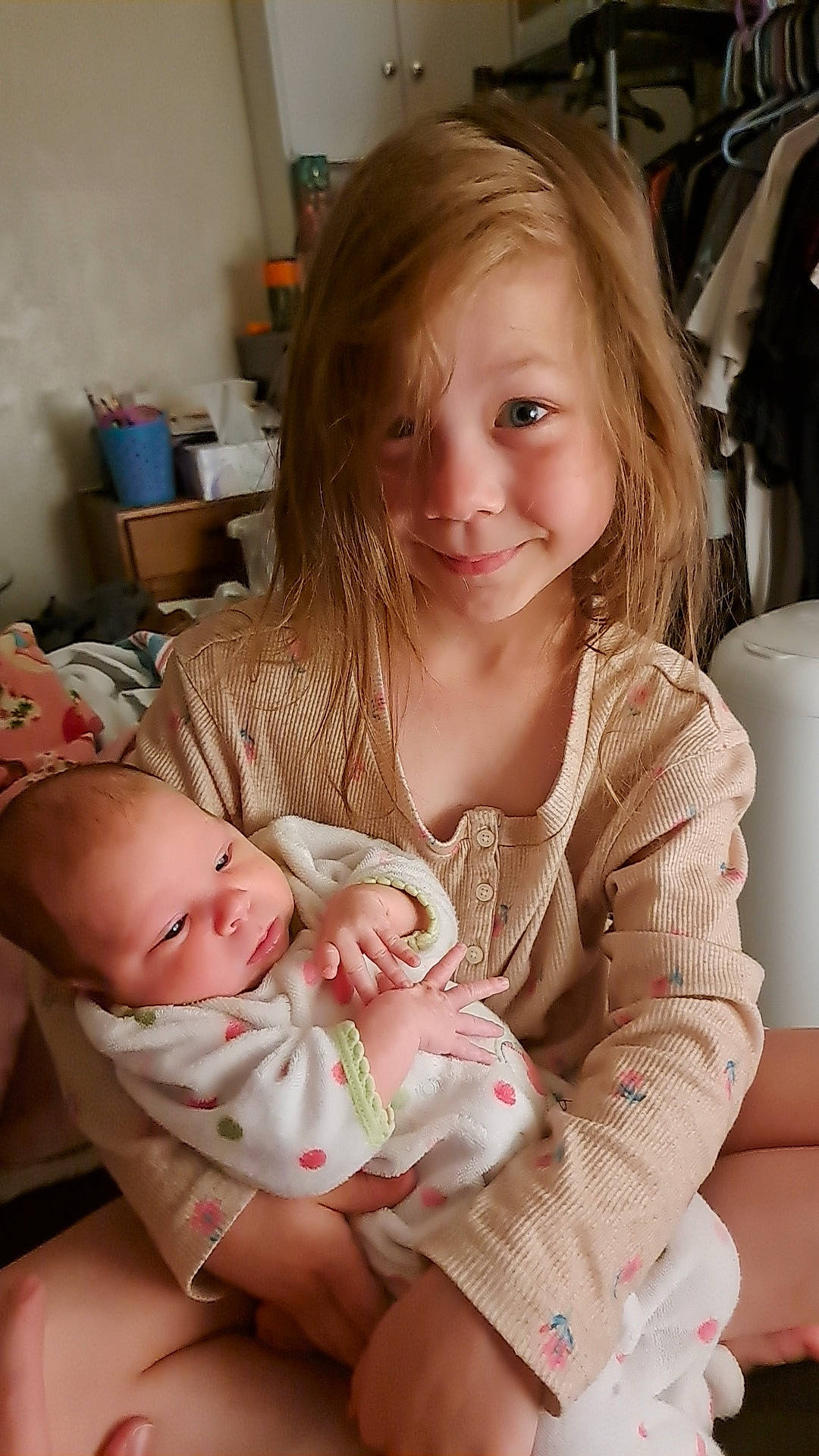 Anastasia is registered to the contest to win money with this photo: baby, baby_toddler_clothing, bag, blond, cheek, child, comfort, eye, finger, fun, hair, happy, iris, joy, luggage_and_bags, mouth, person, sitting, skin, smile