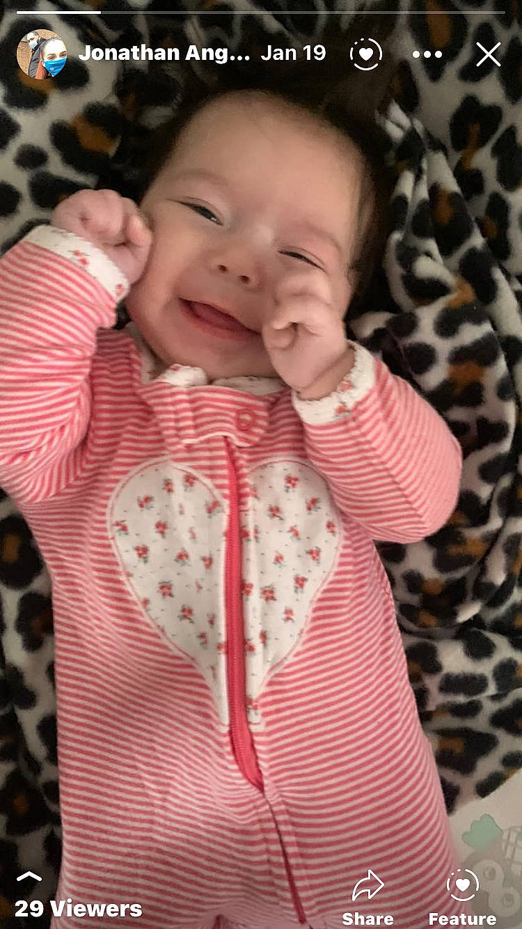 Julianna joined the competition — help win amazing prizes! arm, baby, baby_toddler_clothing, cheek, eye, face, gesture, hand, head, joy, lip, neck, nose, organ, outerwear, person, pink, skin, sleeve, smile