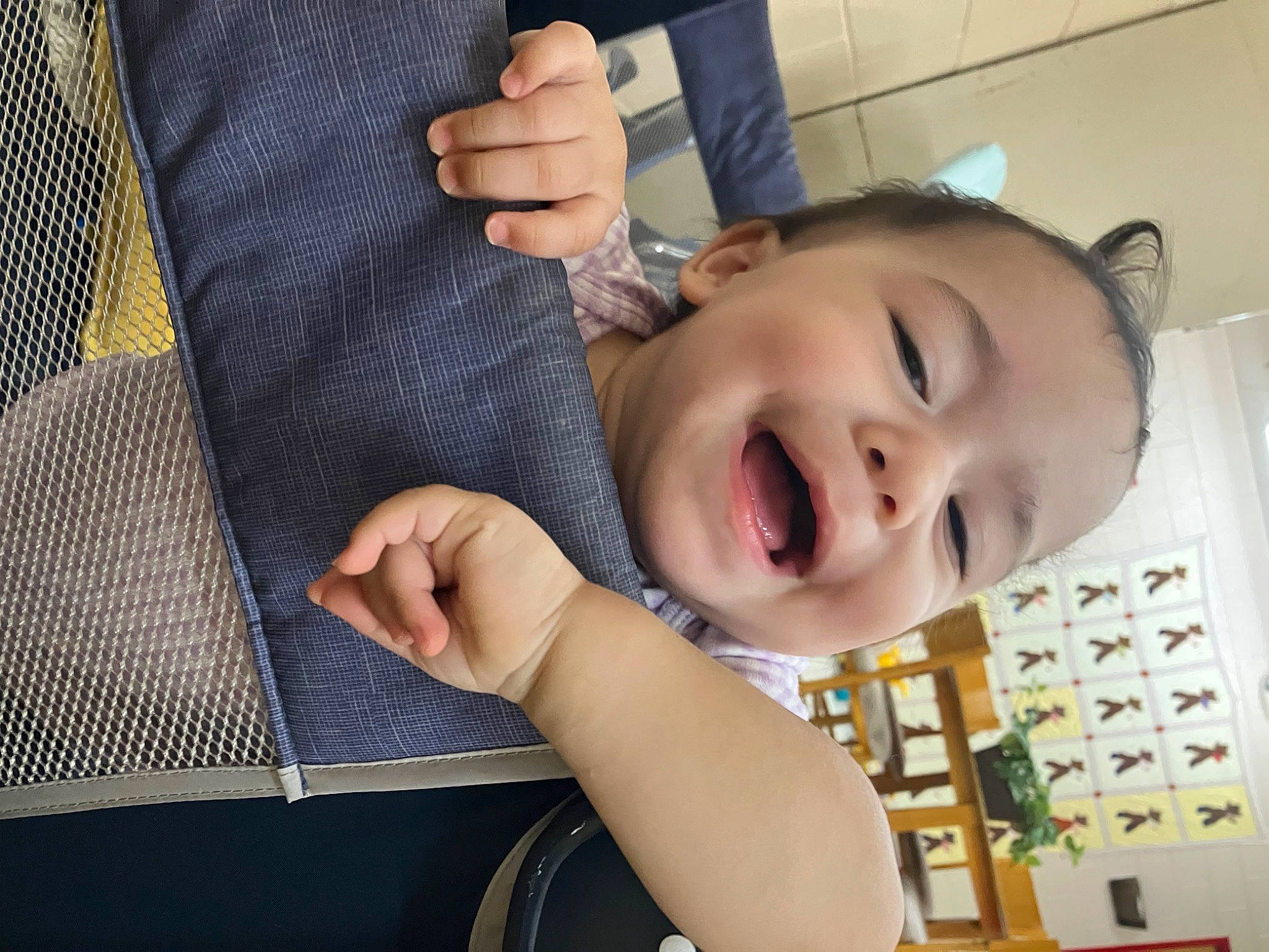 Arianna is registered to the contest to win money with this photo: arm, baby_toddler_clothing, cheek, dress_shirt, eyelash, finger, fun, gesture, hand, happy, human_body, lip, mouth, neck, nose, person, skin, sleeve, smile, thumb