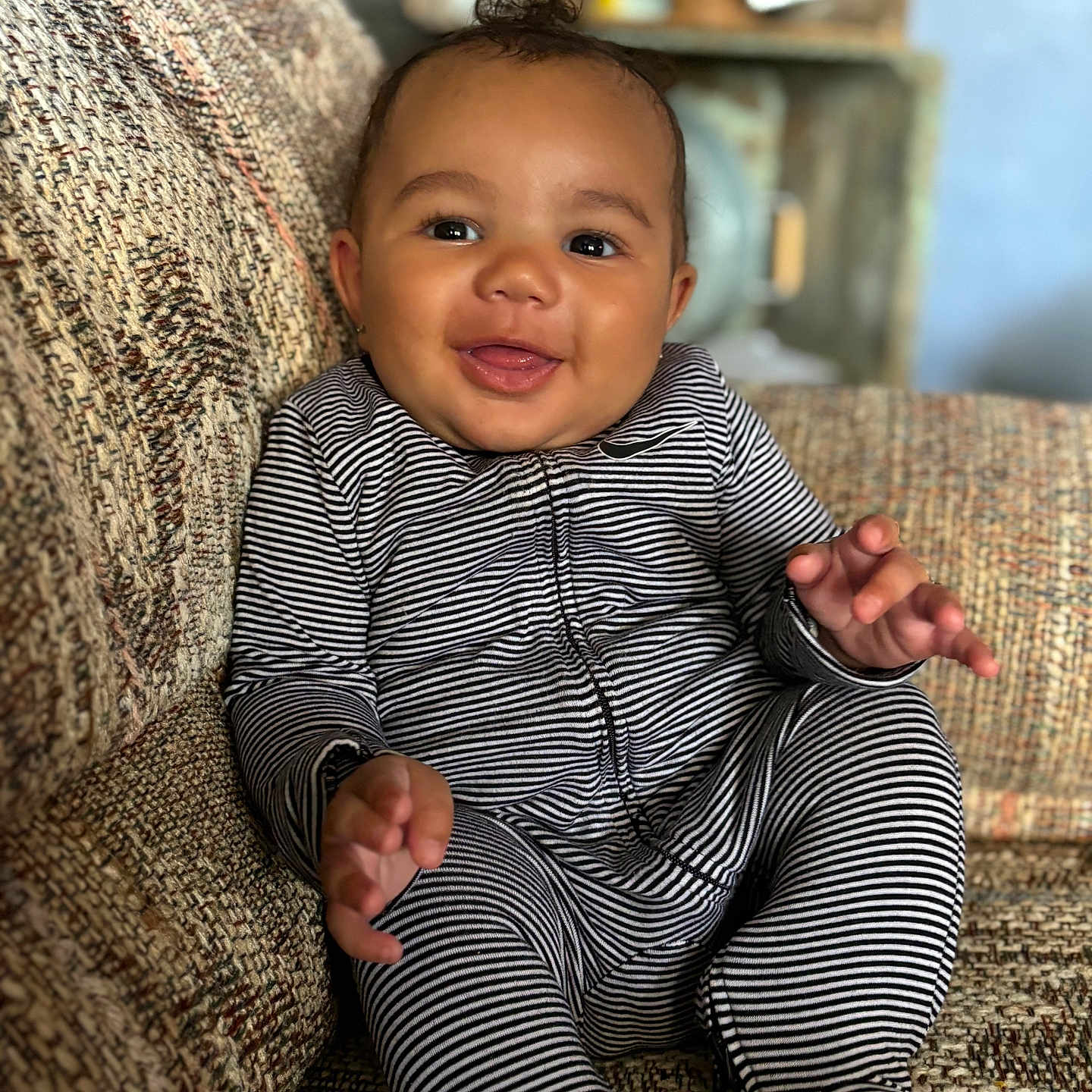 Psalm joined the competition — help win amazing prizes! baby, child, couch, cozy, cute, expression, face, furniture, hands, happy, home, indoor, infant, onesie, person, portrait, seated, smiling, striped_clothing, young